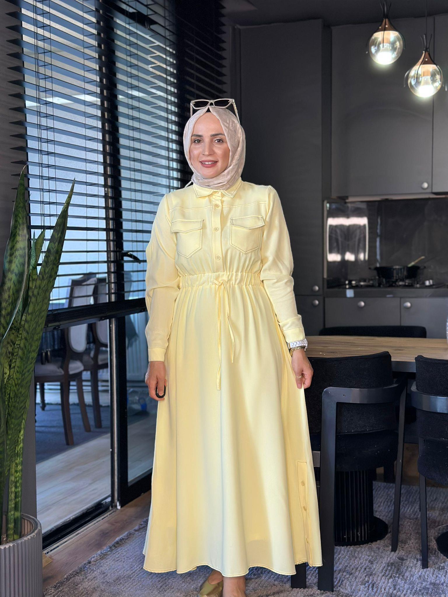 2135 CEP DETAYLI SARI ELBİSE