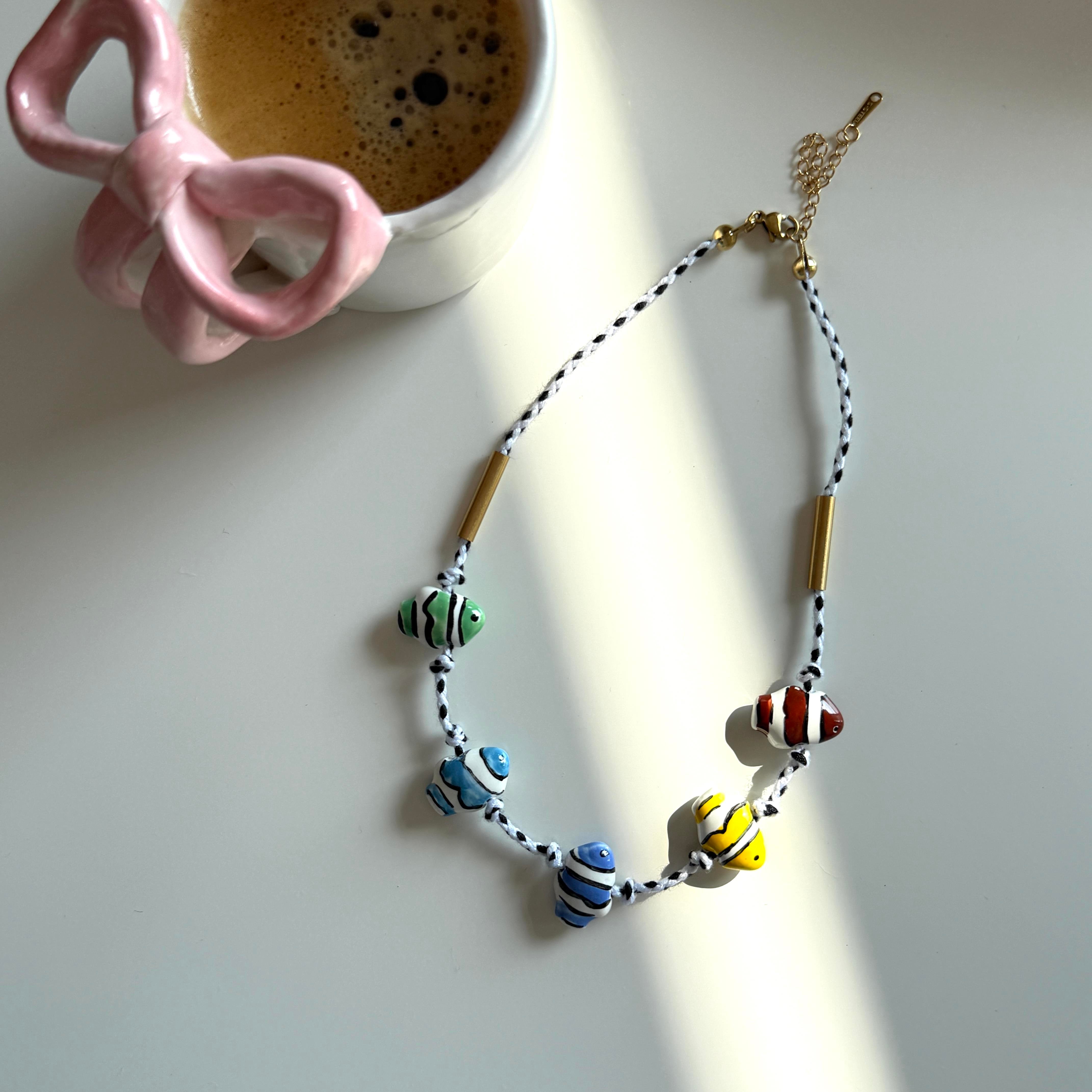 Çelik Seramik Balıklı Kolye