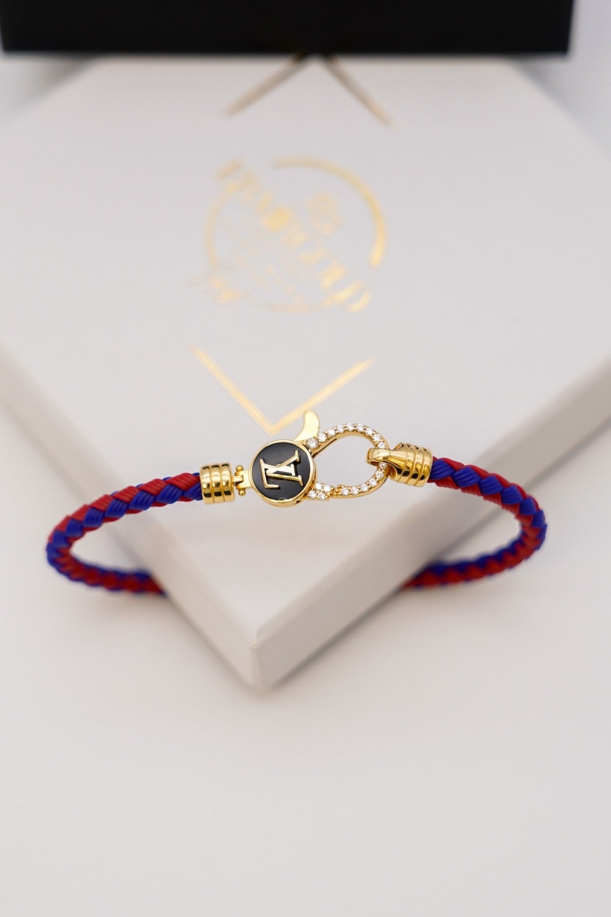 Louis Vuittonn Strickarmband 14 Karat