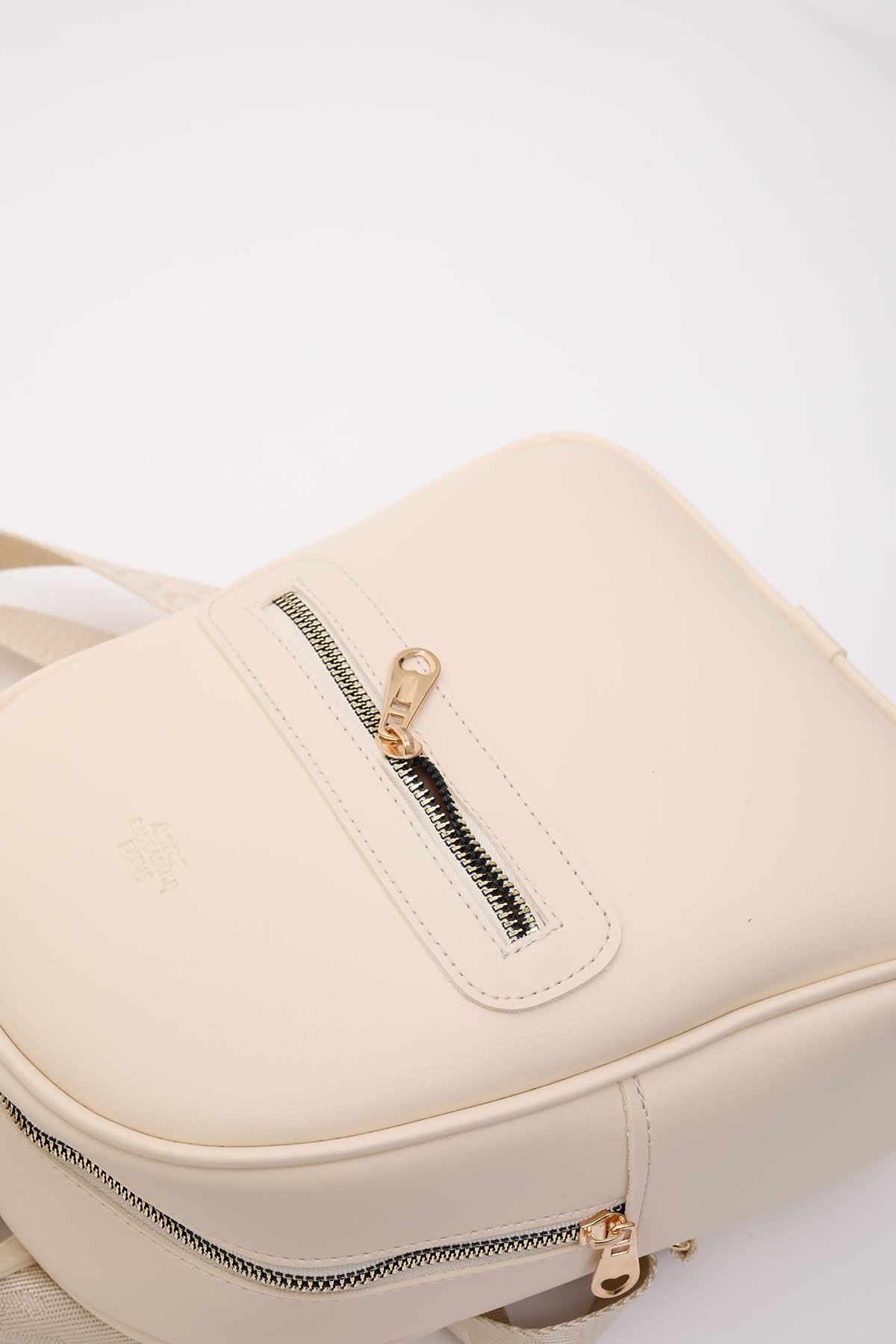 Krem Shk200 Suni Deri 2 Bölmeli Fermuarlı Yazılı Kolon Askılı Sırt Çantası U:26 E:22 G:9 cm