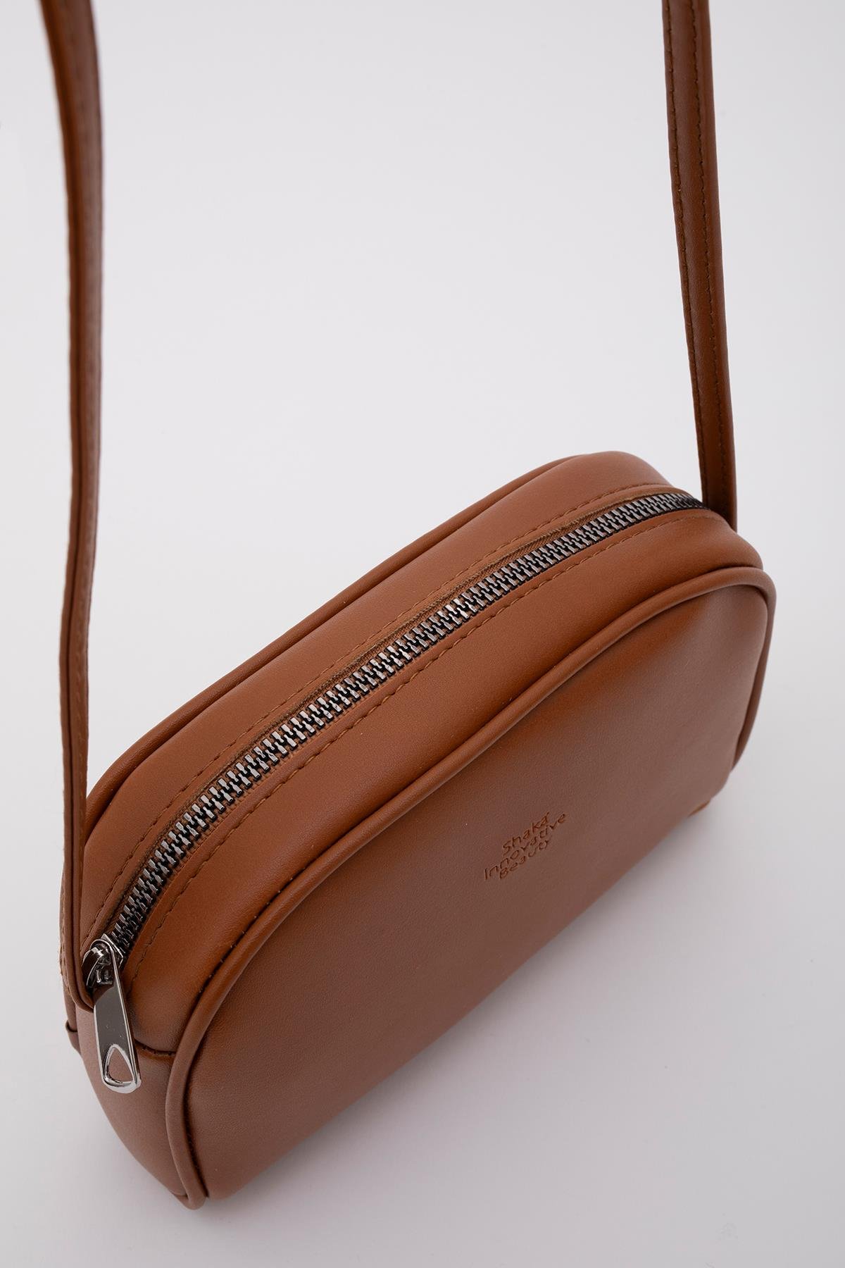 Taba Shk25 Mini Urban Çapraz Askılı Tek Bölmeli Suni Deri Kol ve Omuz Çantası U:19 E:13 G:4 cm