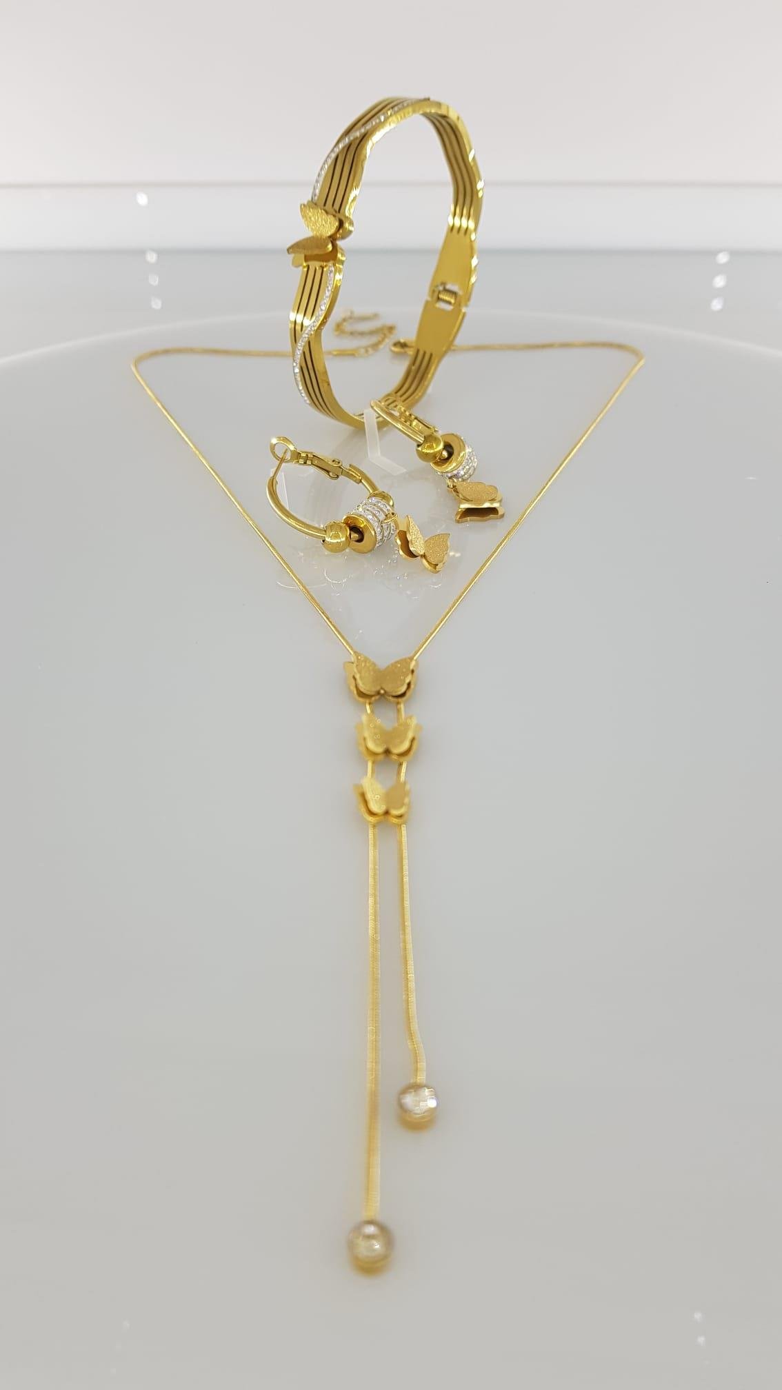 Kelebek Gold Çelik Takı SetiKelebek Gold Çelik Takı Seti Kararma Yapmaz, Zarif Stil