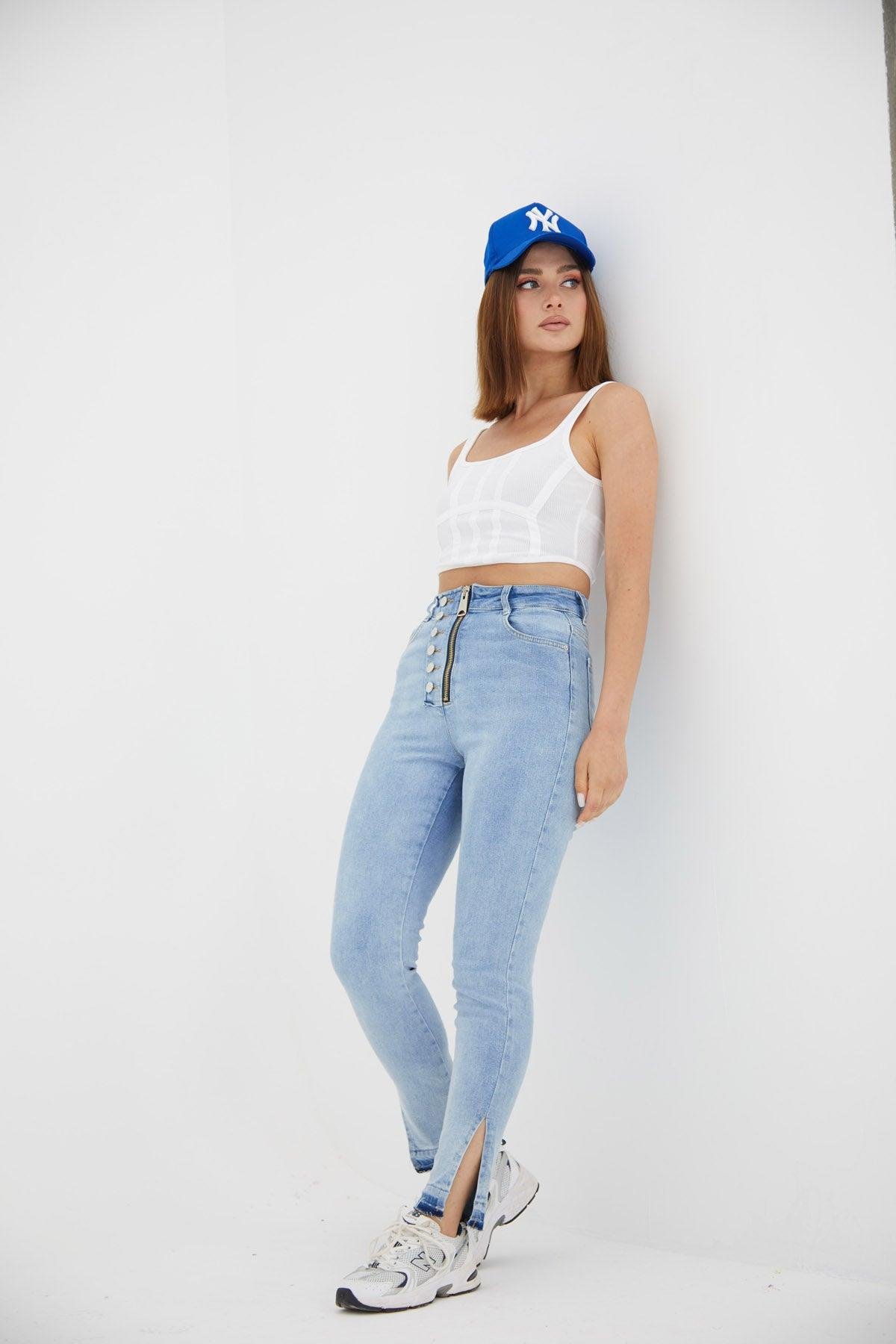 Bel detay taşlanmış mavi toparlayıcı jean