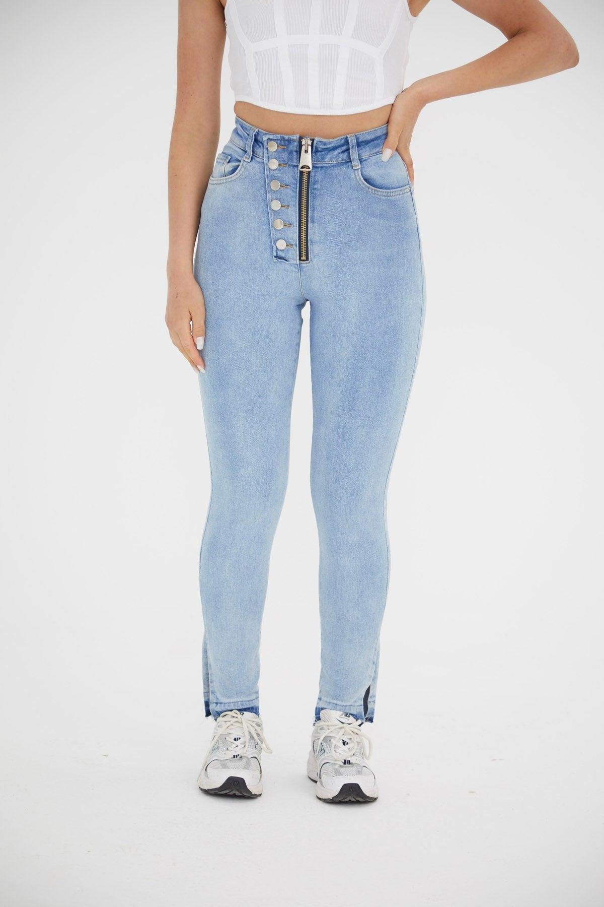 Bel detay taşlanmış mavi toparlayıcı jean