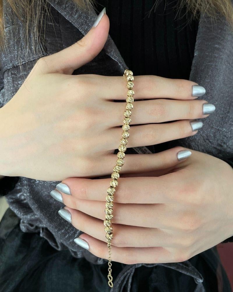 Altın Dorika Taşlı Top Top Kalın Bileklik 14 AyarAltın Dorika Taşlı Top Top Kalın Bileklik 14 AyarDorika Bileklik