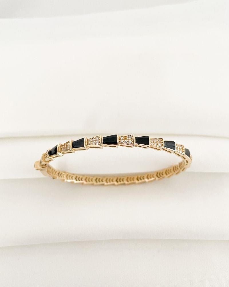 Siyah Mineli Altın Bulgari BilezikSiyah Mineli Altın Bulgari Bilezik14 Ayar Bilezik