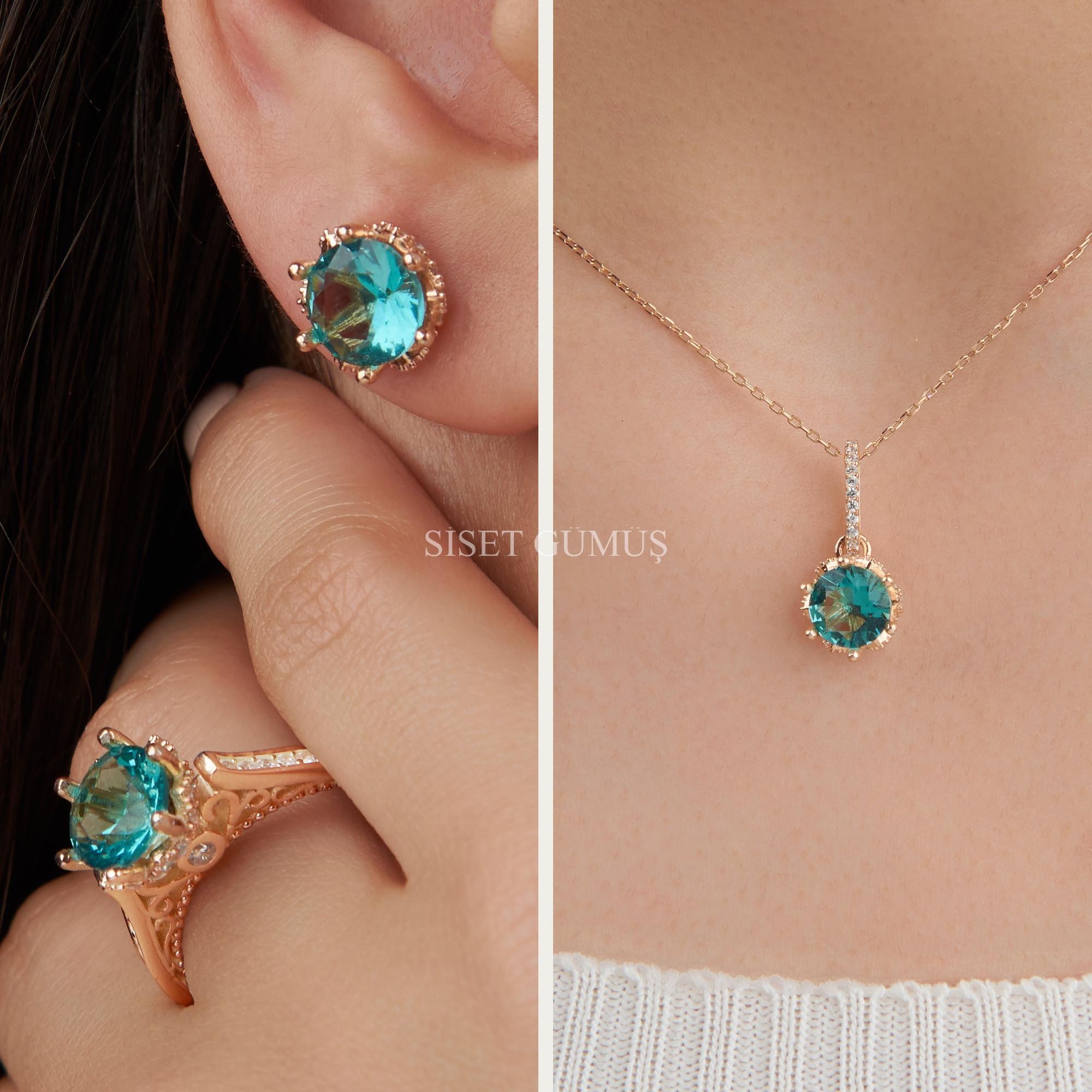 925 Ayar Gold  Rose Kaplama Efsane Model  Aquamarin Taşlı Üçlü Gümüş Set