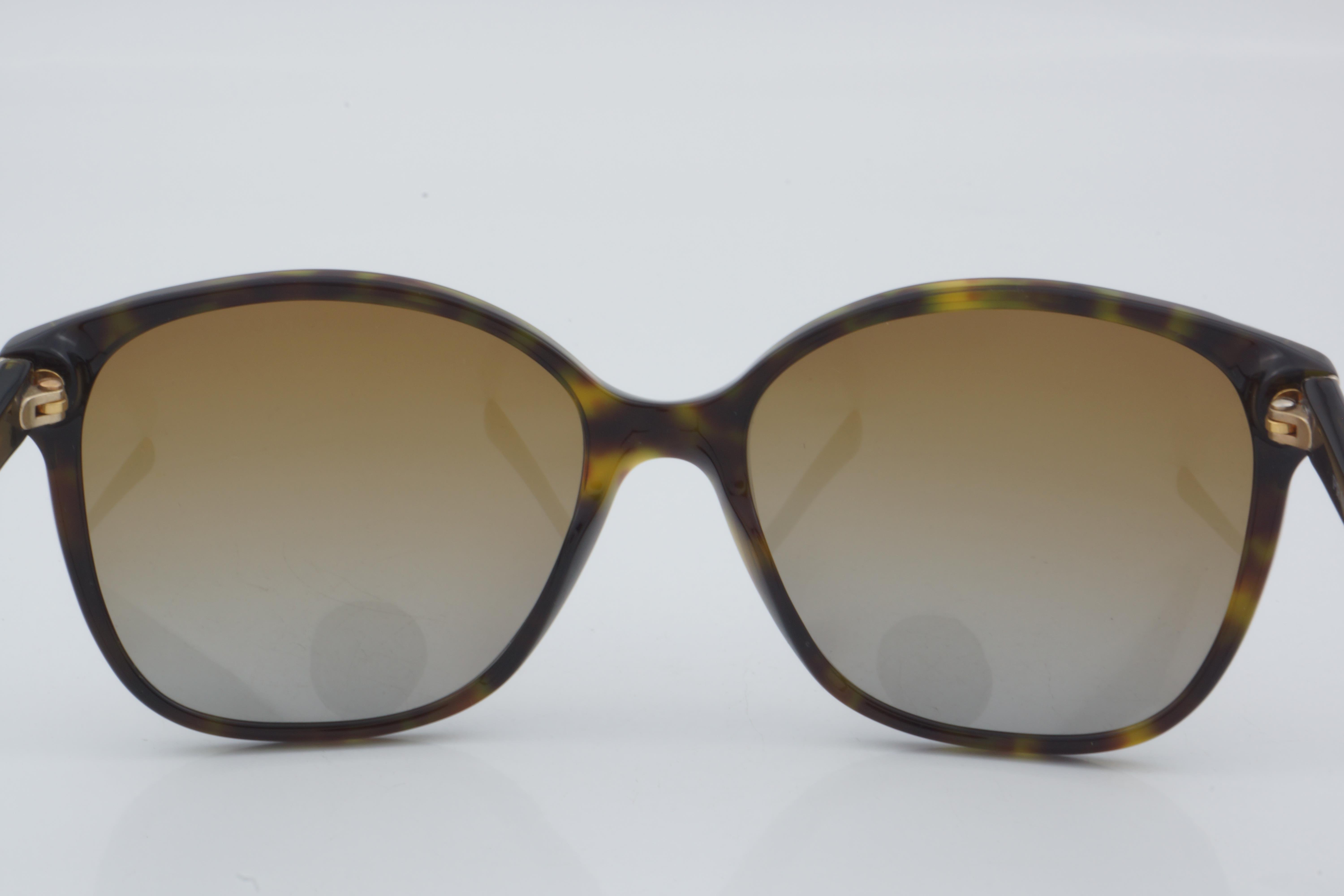 Prada SPR 01O 2AU-6E1 55 - 01 Güneş Gözlüğü