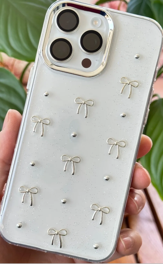 Fibaks Apple iPhone 15 Pro Max Kılıf Fiyonk Desenli Şeffaf Simli Gümüş Kamera Çıkıntılı Parlak Kapak