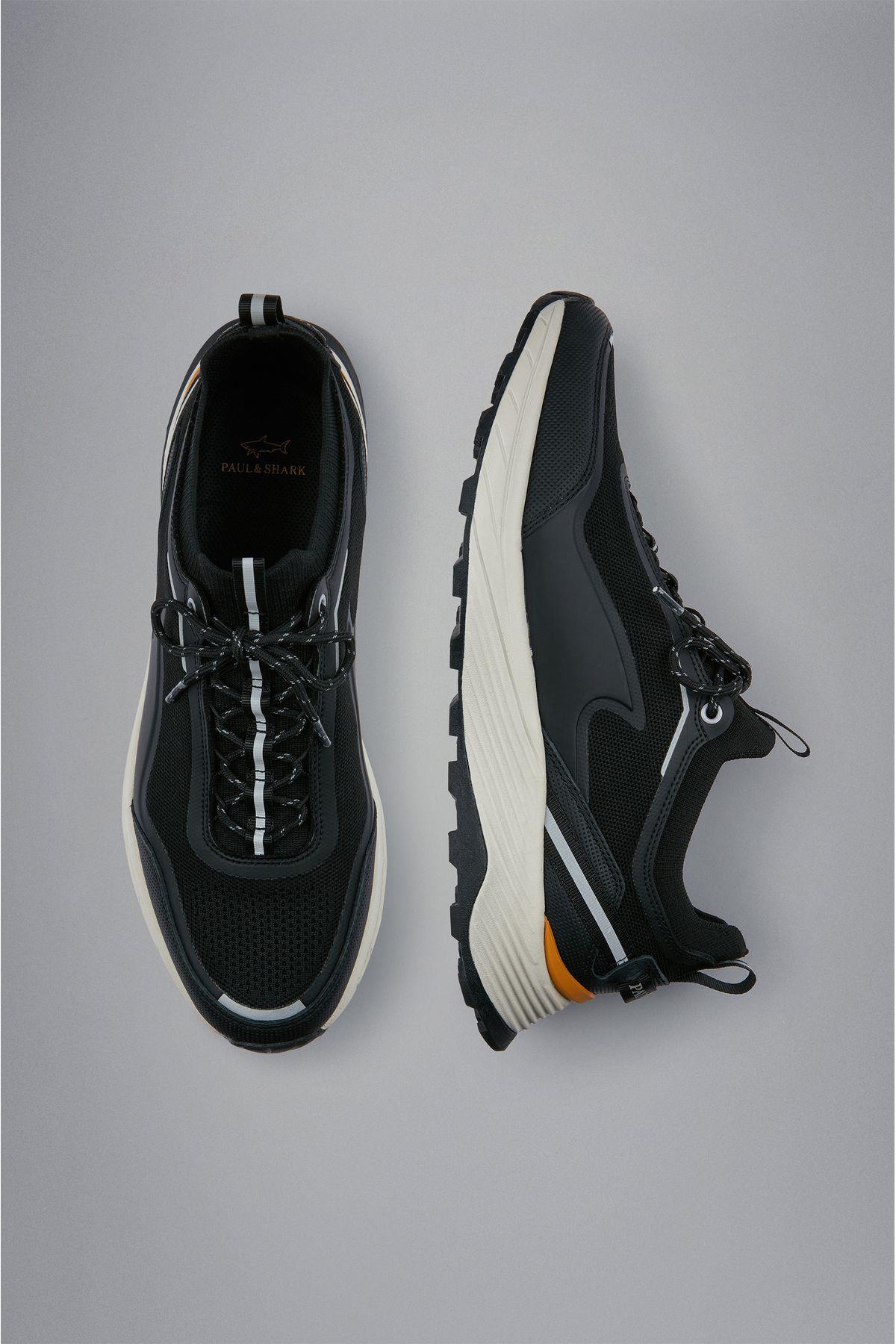 sneakers-fe834e.jpg