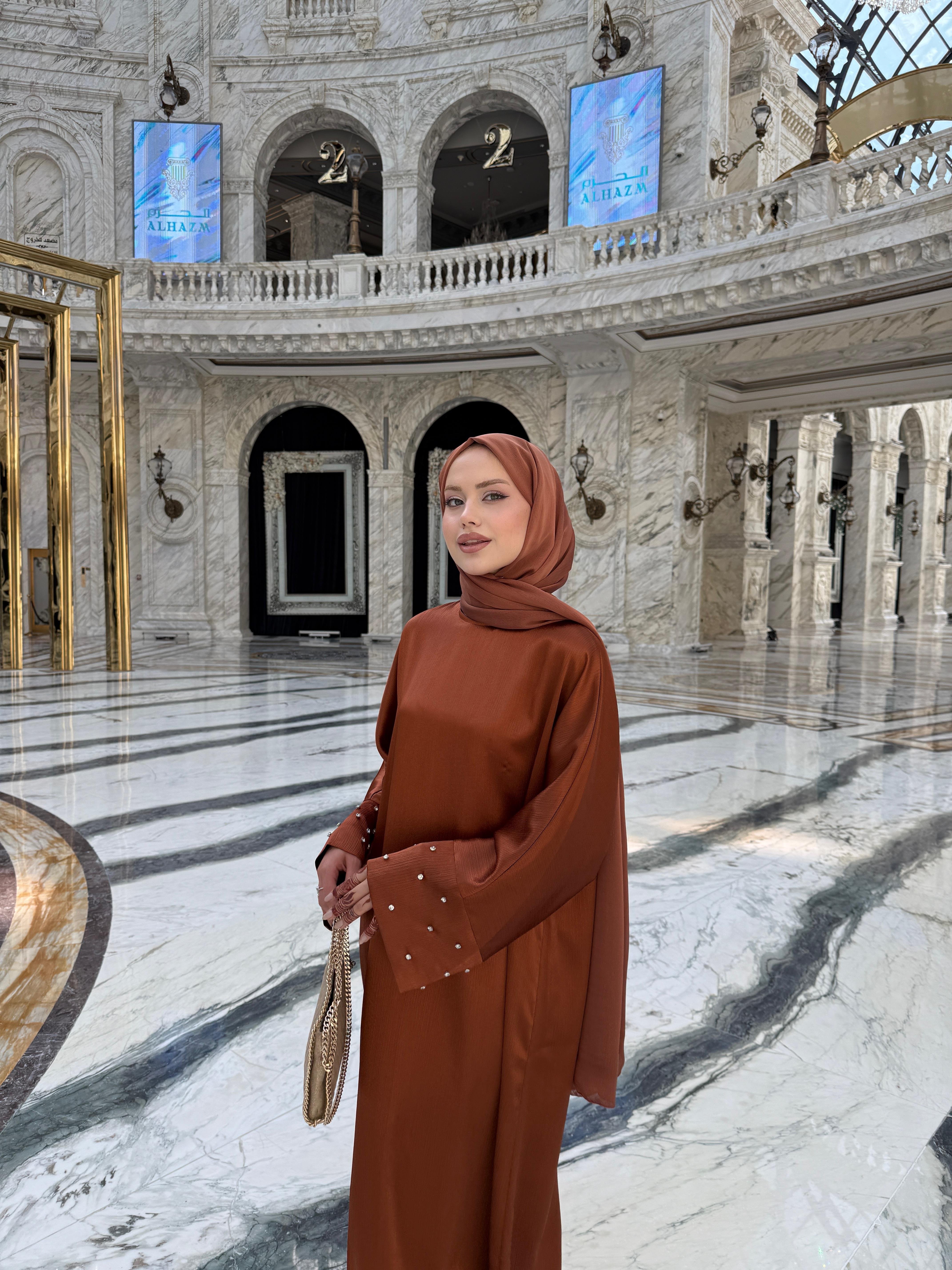 Doha Elbise Tarçın
