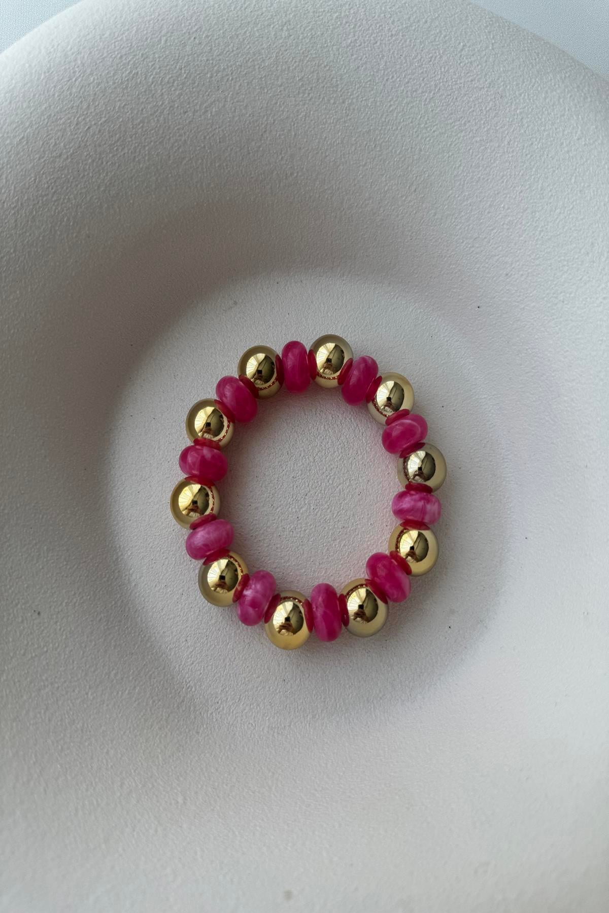 PEMBE LASTİKLİ BİLEKLİK