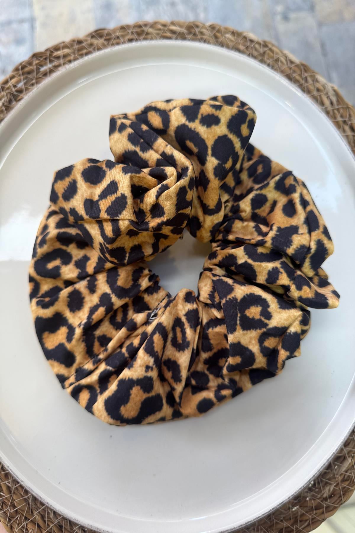 SARI LEOPAR LASTİK TOKA