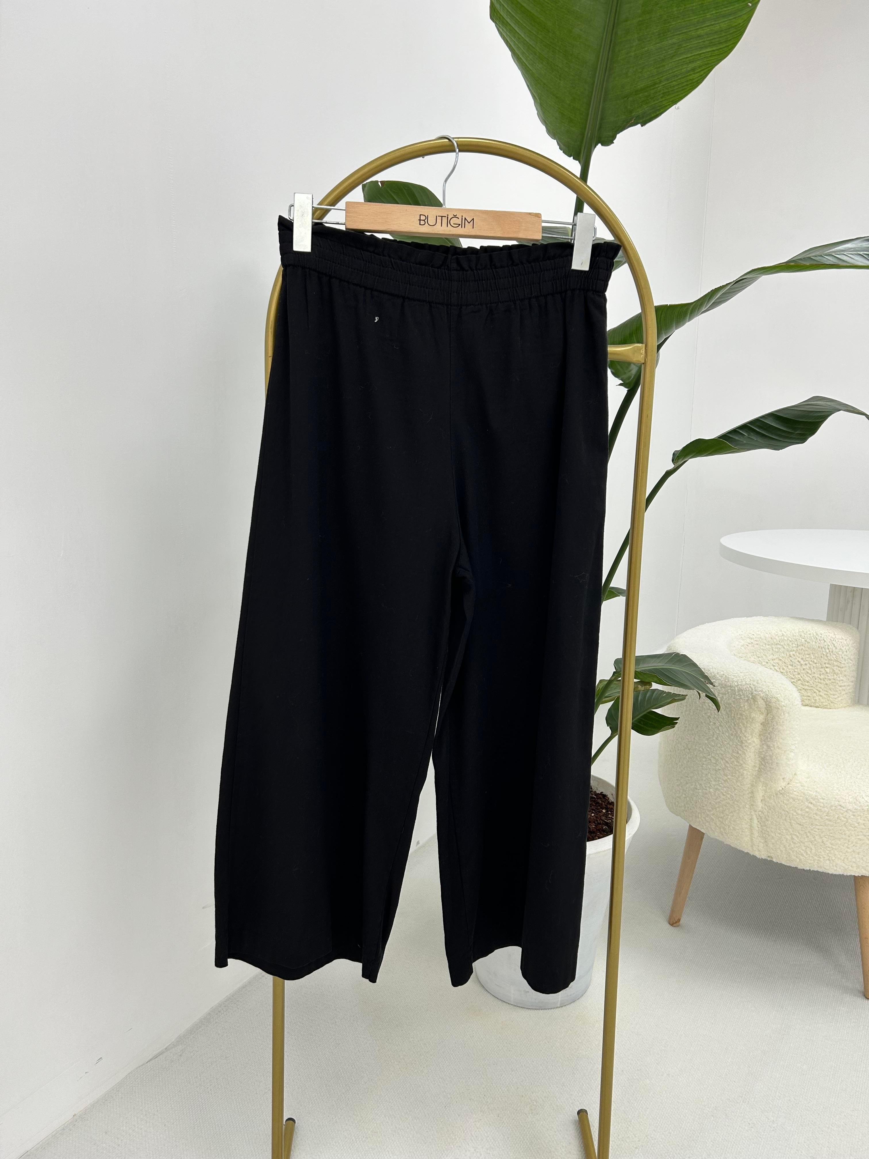 Beli Lastik Detaylı Siyah Pantolon 