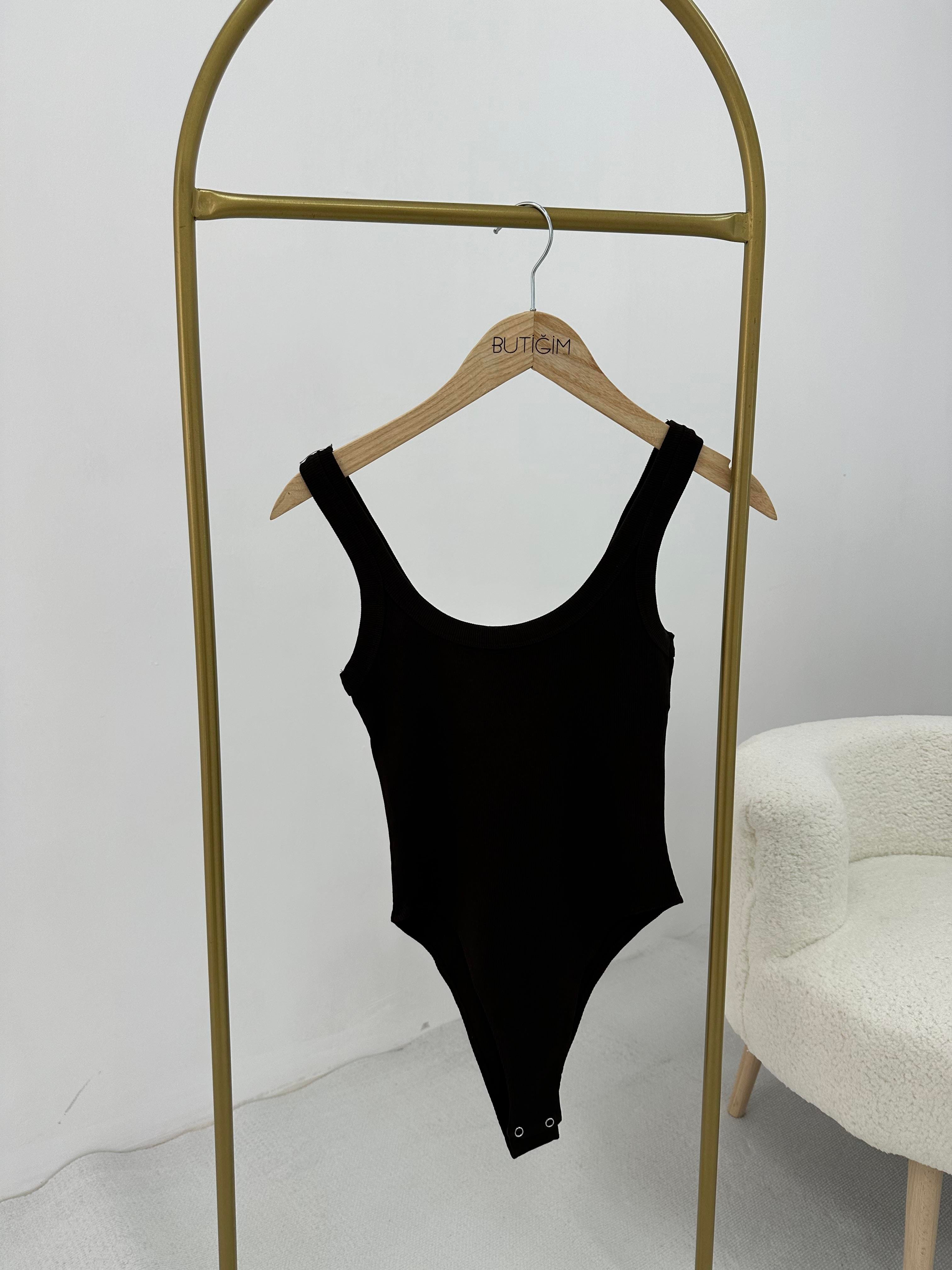 Kahverengi bodysuit atlet 