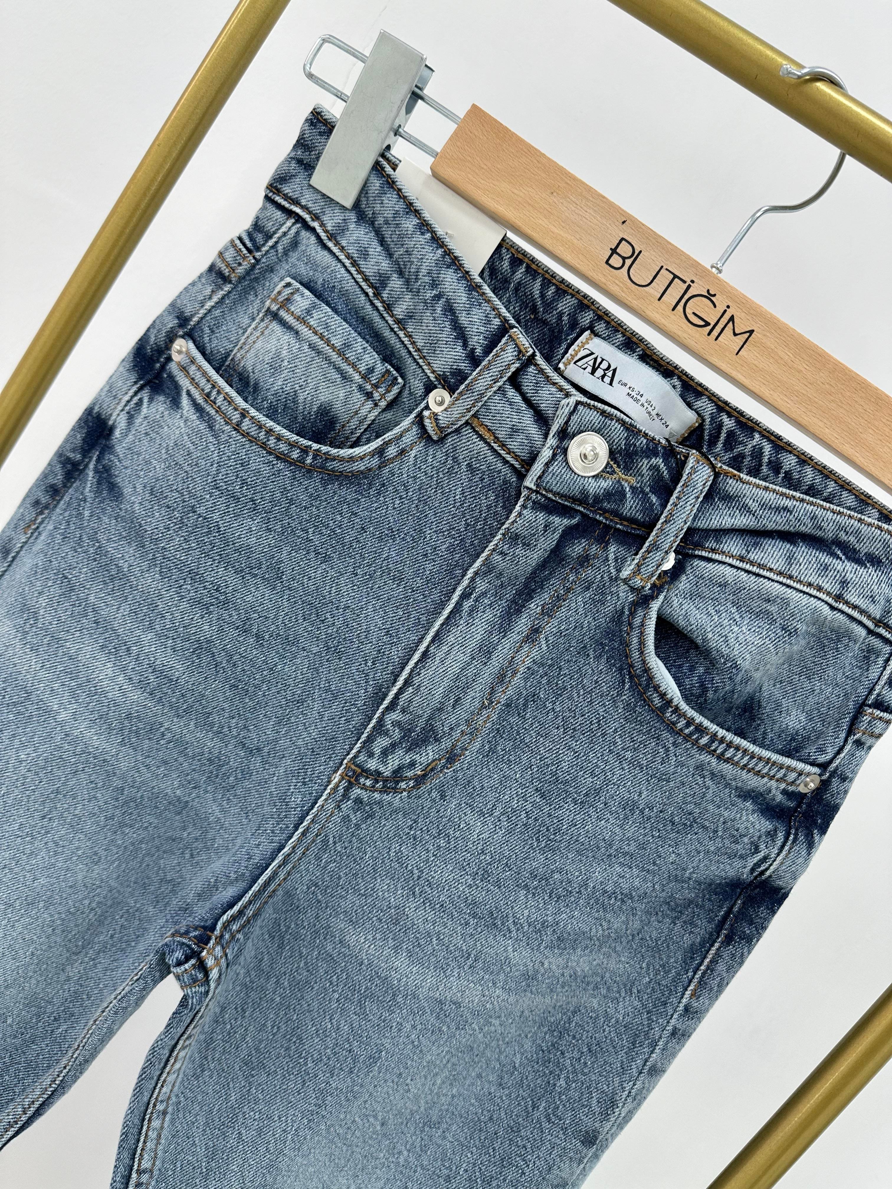Kesik Paça Boyfit Açık Mavi Jean 