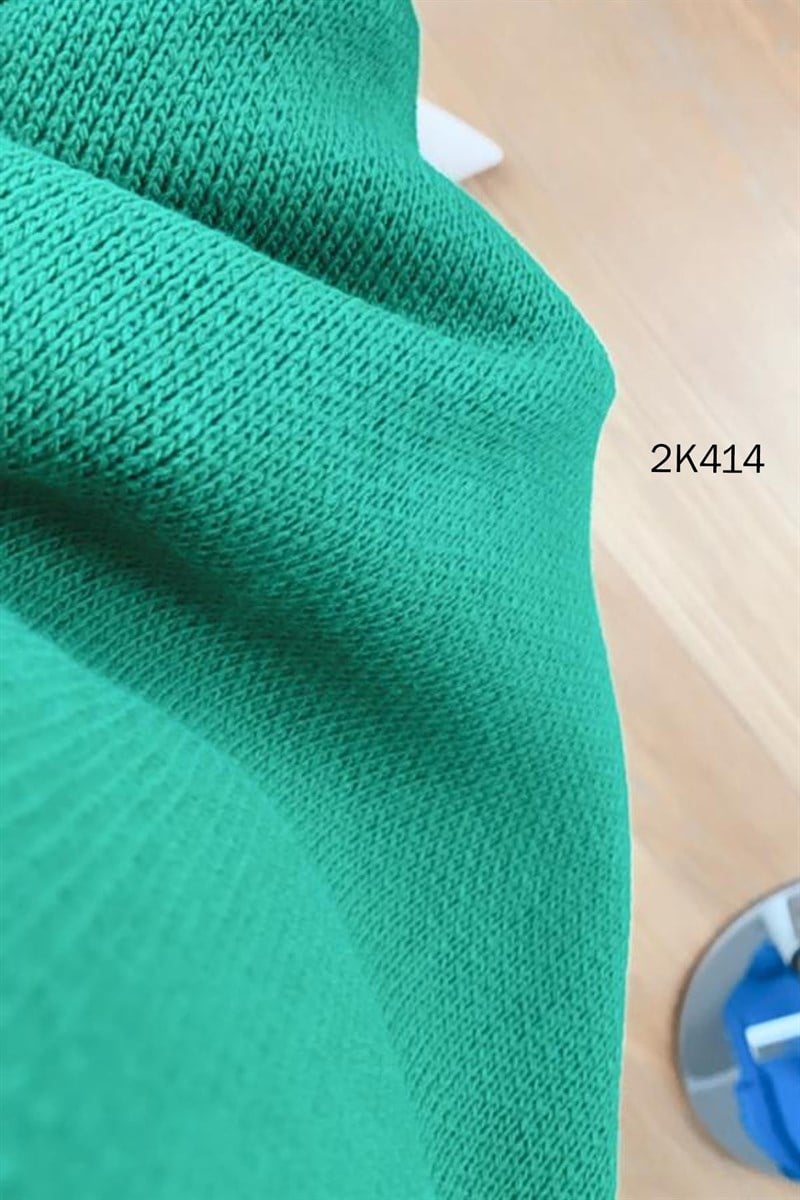 Kolu Düğmeli Boğazlı Triko Bluz