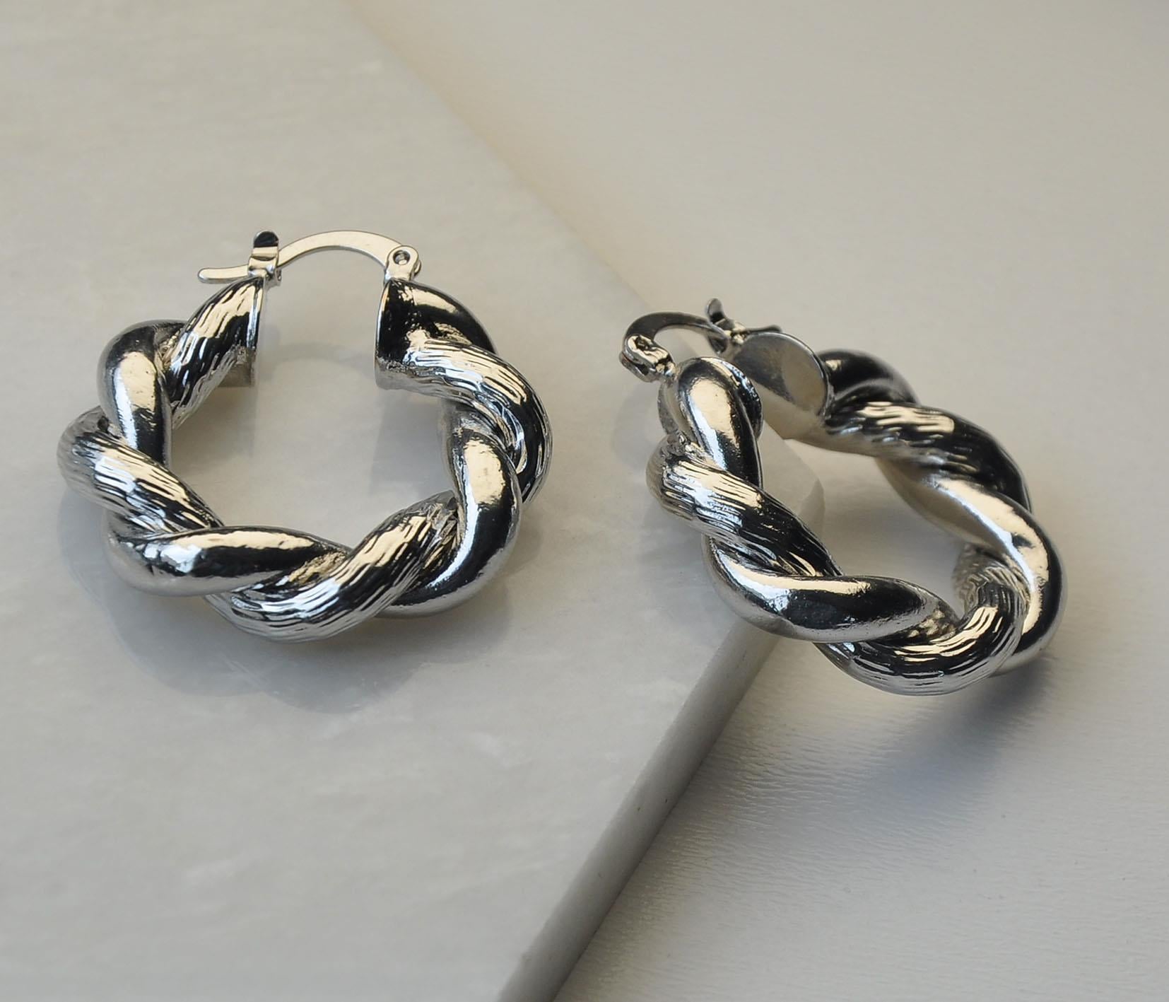 Silver burgu tasarım küpe