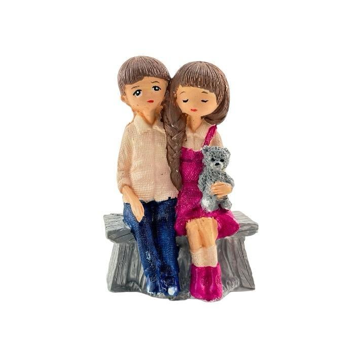 Kütükte Oturan Çift 