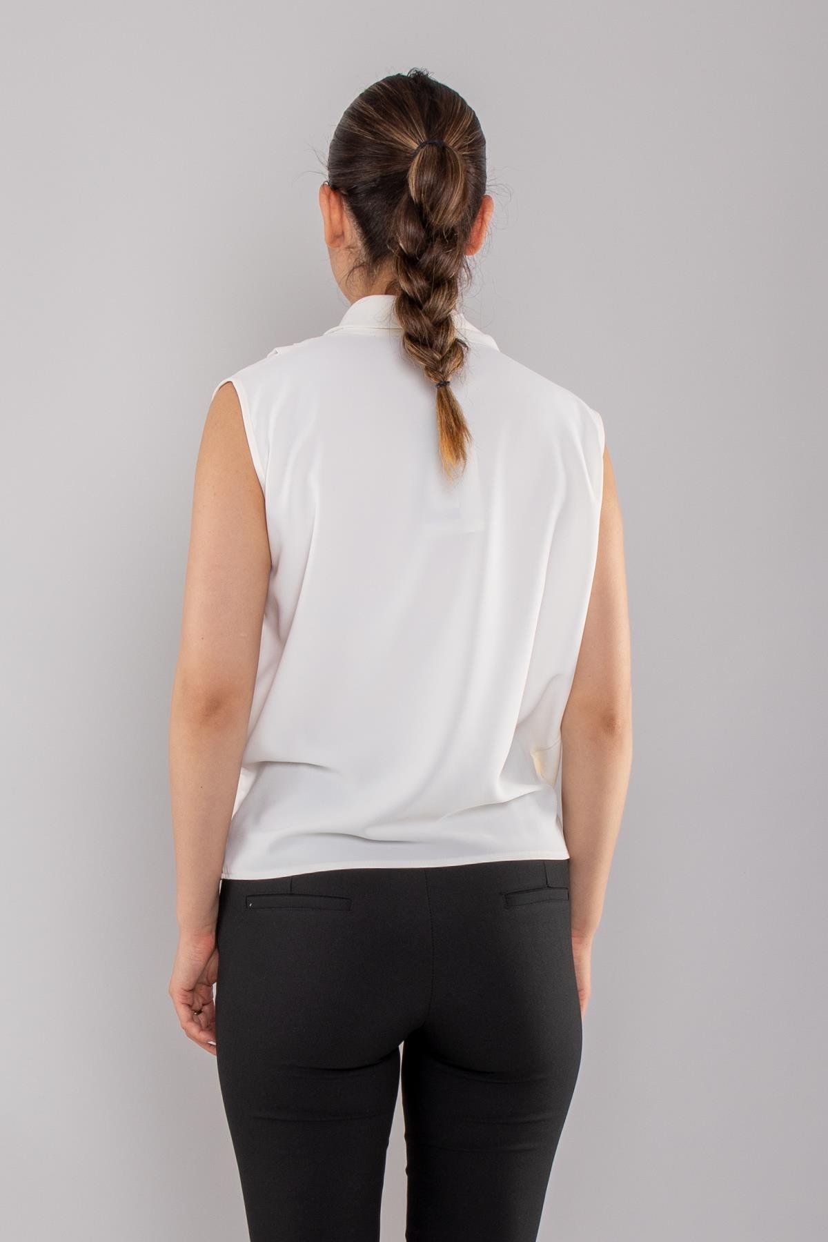 81856 Kruvaze Yaka Dökümlü Kolsuz Şifon Bluz