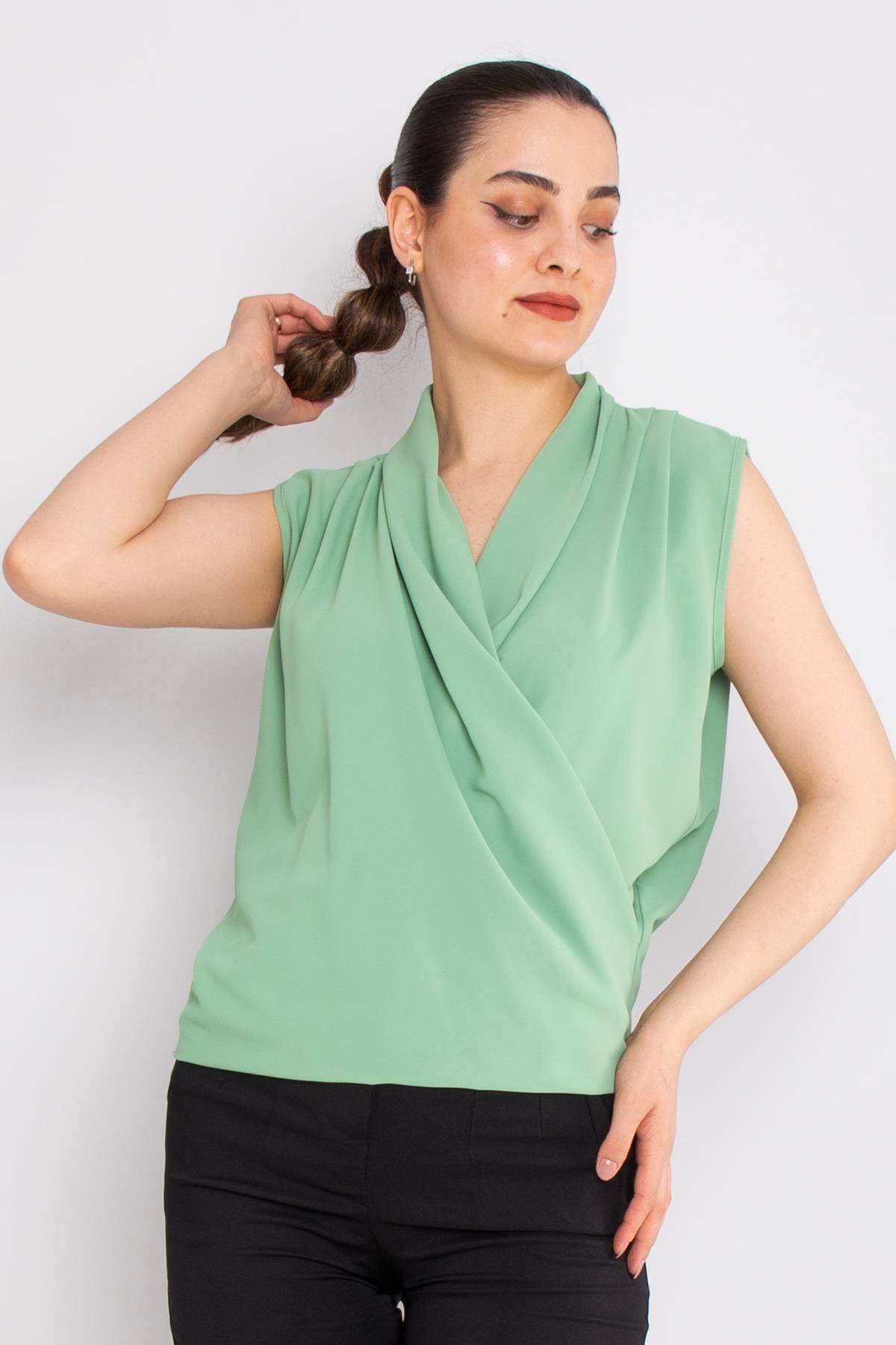 81856 Kruvaze Yaka Dökümlü Kolsuz Şifon Bluz