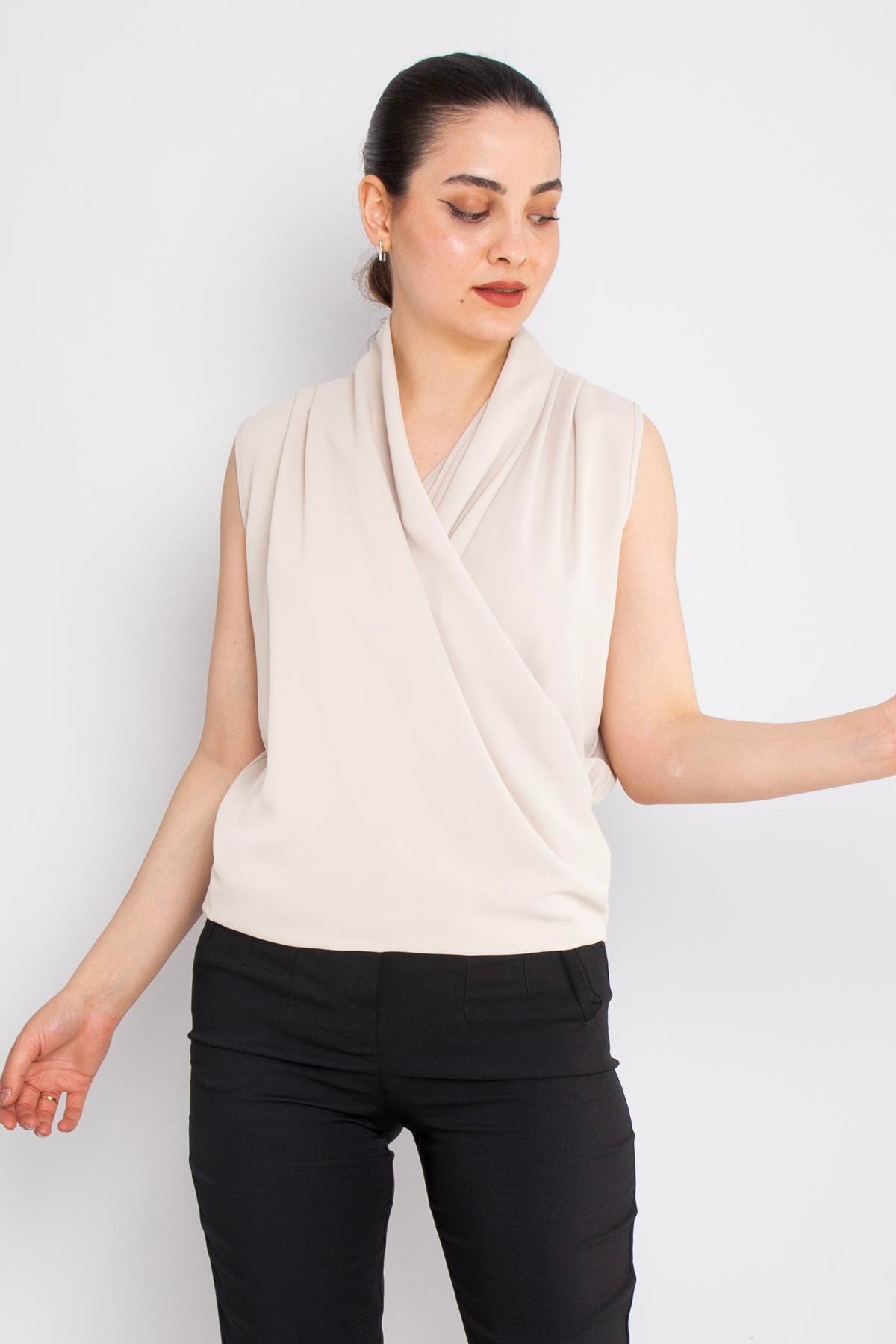 81856 Kruvaze Yaka Dökümlü Kolsuz Şifon Bluz