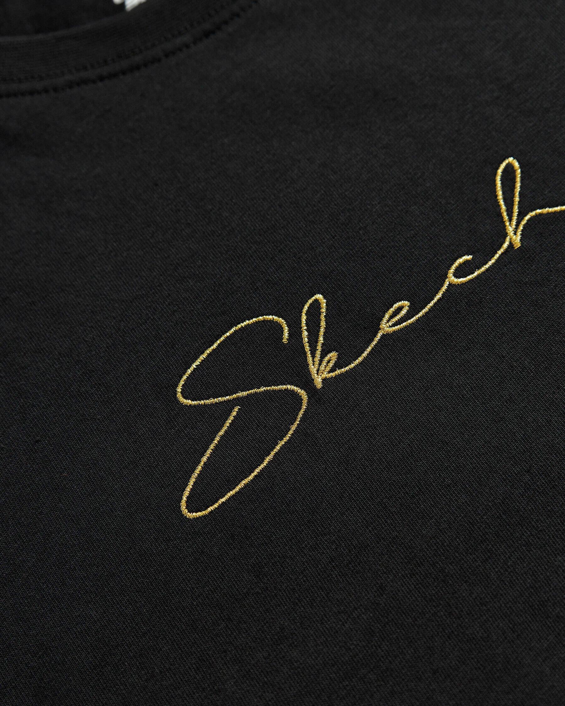 Skechers W Graphic Tee Light Weight Regular T-Shirt S242166-001 Kadın T-shirt - Siyah