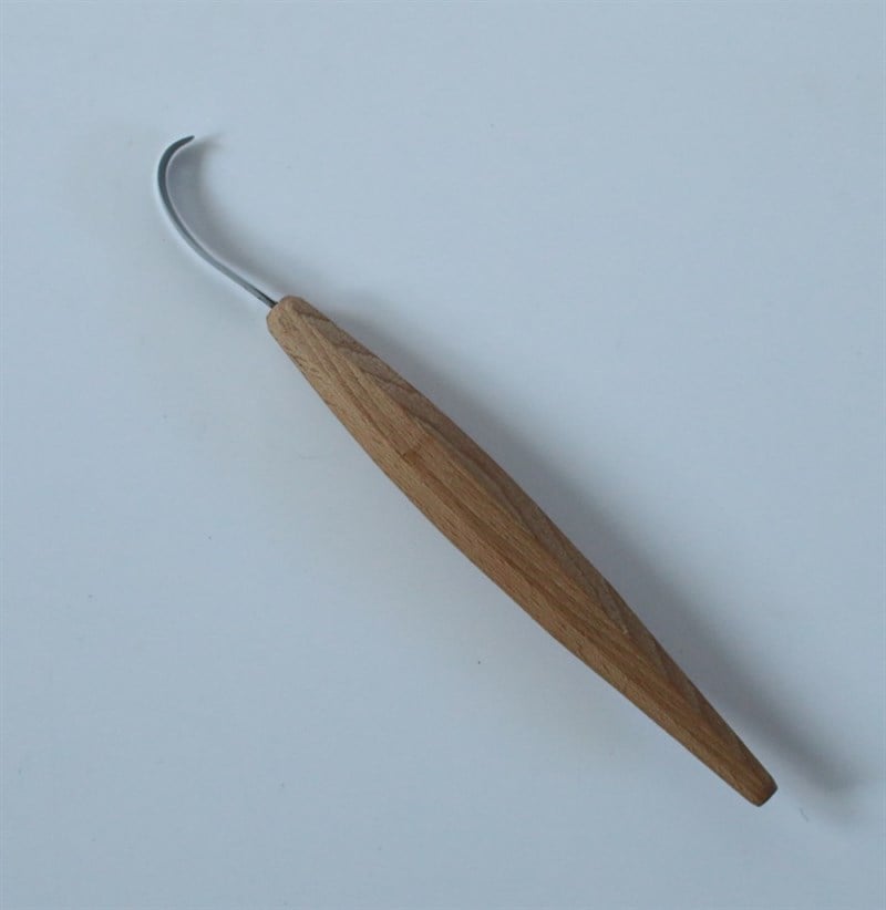 Spoon knife right hand compound curve
