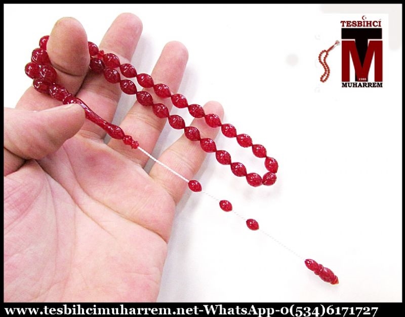 ATEŞ KEHRİBARI TESBİH 8x11 mm KALEM İŞÇİLİKLİ UMAY
