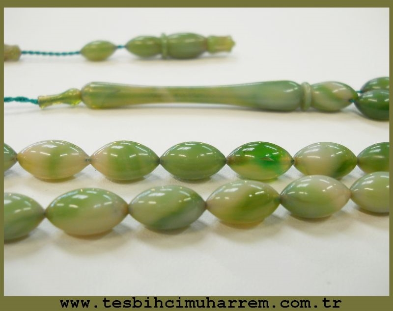6.5X11.5 mm TESBİH-ÜL BAHARİSTAN DAMARLI YEŞİLLER TONDA SIKMA KEHRİBAR