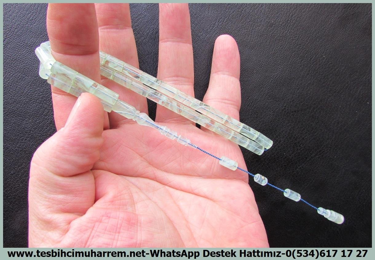 Hareli Mavi Kehribar TesbihlerTM14032Aykut Güner Usta İşçilikli Sıkma Kehribar Tesbih – Uçuk Mavi Damarlı, Özel Dik Kesim, “Bulutların Ötesinde” İsimli Koleksiyonluk TespihTespih Sıkma Kehribar I Özel Dik Kesme Damarlı Uçuk Mavi Bulutların Ötesinde Tesbih