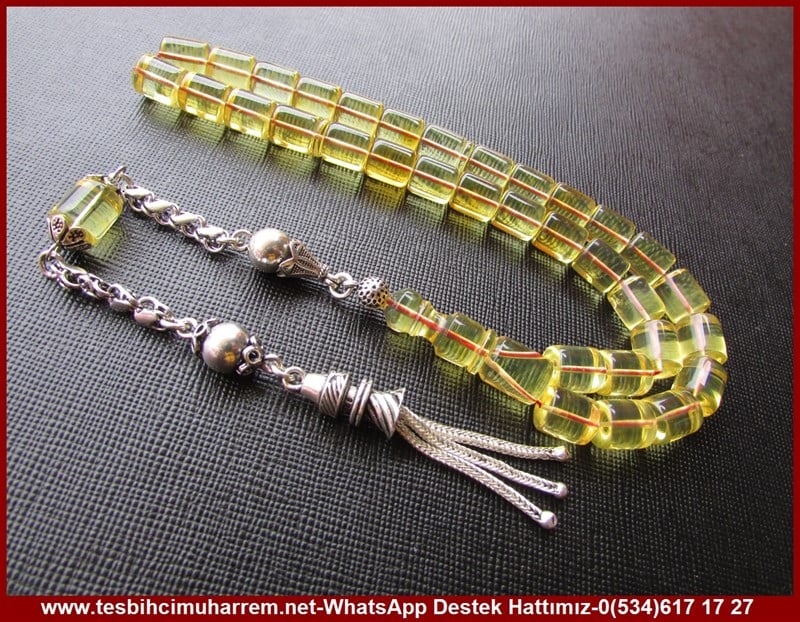  Damla Kehribar TesbihlerTM11119Damla Kehribar Tesbih Gümüş Püsküllü Bilek Boy Şeffaf Sarı Kesme Model ÇekerekDamla Kehribar Tesbih Gümüş Püsküllü Bilek Boy Şeffaf Sarı Kesme Model Çekerek