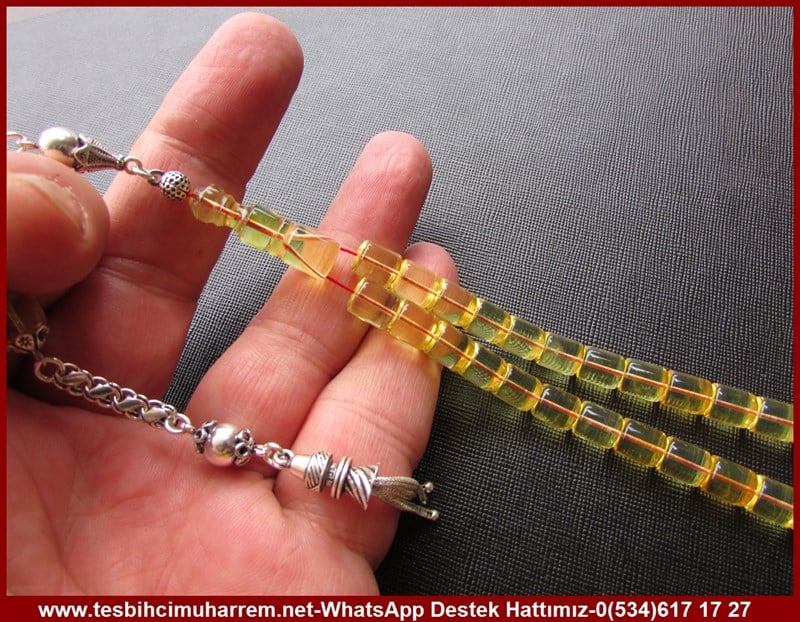  Damla Kehribar TesbihlerTM11119Damla Kehribar Tesbih Gümüş Püsküllü Bilek Boy Şeffaf Sarı Kesme Model ÇekerekDamla Kehribar Tesbih Gümüş Püsküllü Bilek Boy Şeffaf Sarı Kesme Model Çekerek