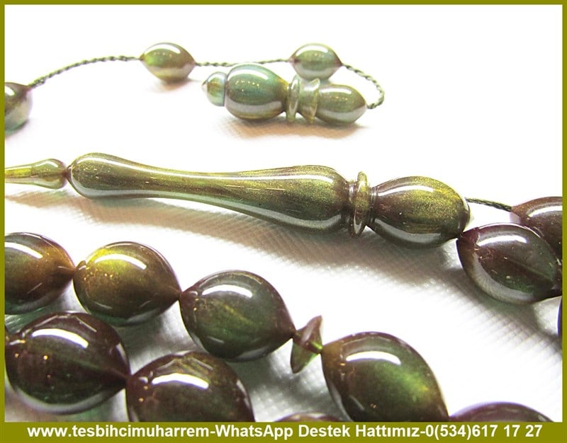 Osmanlı Habbeden Sıkma Kehribar TesbihlerTM11067Eski Döküm Oriental Sıkma Kehribar Beyzi Kesim Kum Simli Haki Yeşil PataraEski Döküm Oriental Sıkma Kehribar Beyzi Kesim Kum Simli Haki Yeşil Patara