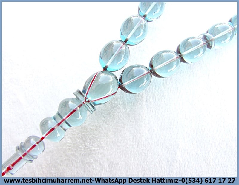 Katalin Ve Bağa TesbihlerTM12251Kendinize,eşinize,arkadaşınıza,sevgililer gününe,babalar günününe alabileceğiniz en güzel hediye tesbih..Aqua Blue Beyzi Kesim Bilek Boy Efe Maskot Katalin Tesbih Camgöz