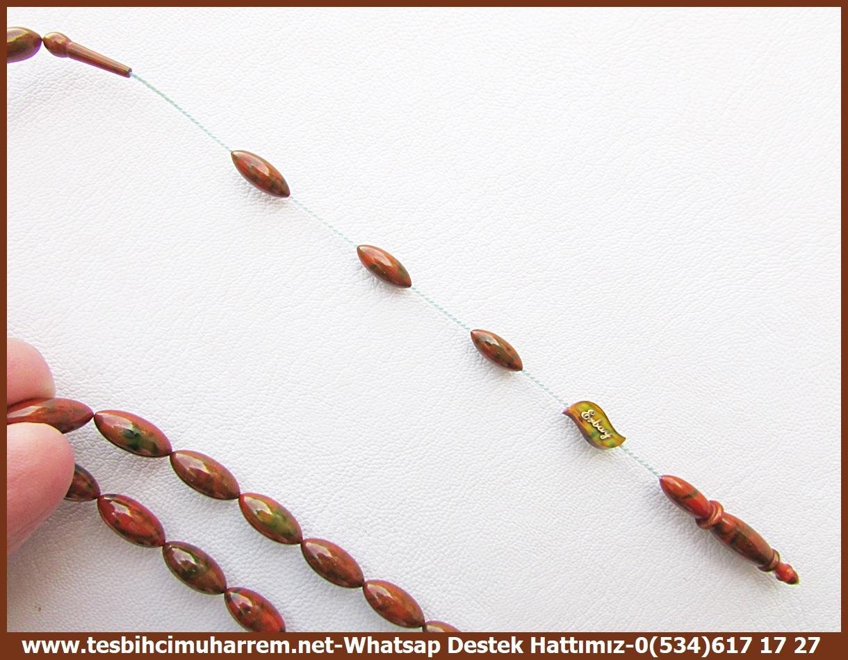 Katalin Ve Bağa TesbihlerTM11415Mustafa Erbay Usta El İşçiliği Tespih | Katalin, Eski Antika Alman Obje, Mavi Beyazdan Kahveye Dönüşüm Benekli Uzun Arpa Şımarık TespihTespih Uzun Arpa Katalin I Eski Alman Objeden Mavi Beyazdan Kahveye Dönüşüm Şımarık Tesbih 