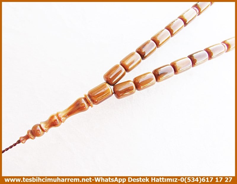 Katalin Ve Bağa TesbihlerTM11866Tesbih Katalin Damarlı Koyu Kahve Krem Karamel Kapsül Kesim ŞemmameTesbih Katalin Damarlı Koyu Kahve Krem Karamel Kapsül Kesim Şemmame
