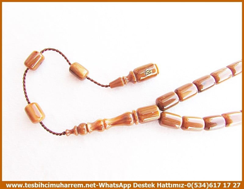 Katalin Ve Bağa TesbihlerTM11866Tesbih Katalin Damarlı Koyu Kahve Krem Karamel Kapsül Kesim ŞemmameTesbih Katalin Damarlı Koyu Kahve Krem Karamel Kapsül Kesim Şemmame