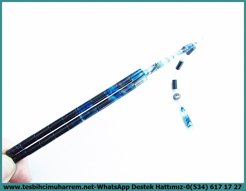 Hareli Mavi Kehribar TesbihlerTM11326Tesbih Sıkma Kehribar Kum Simli Turkuaz Yansımalı Dik Kesme Diyarbakır MerkezTesbih Sıkma Kehribar Kum Simli Turkuaz Yansımalı Dik Kesme Diyarbakır Merkez