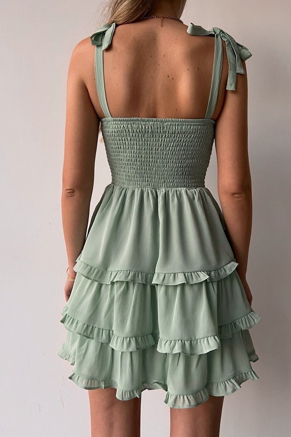 AEROBİN KUMAŞ GÖĞÜS DEKOLTELİ ETEĞİT KAT DETAYLI SIRTI GİPELİ YEŞİL ELBİSE GREEN DRESS MSCX-116-YEŞİL