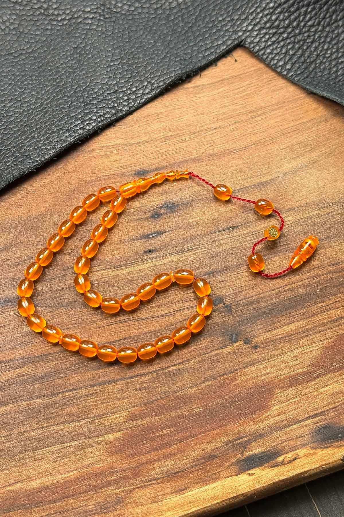 7*6 Küçük Boy Usta Mühürlü Zar Kehribar Tesbih