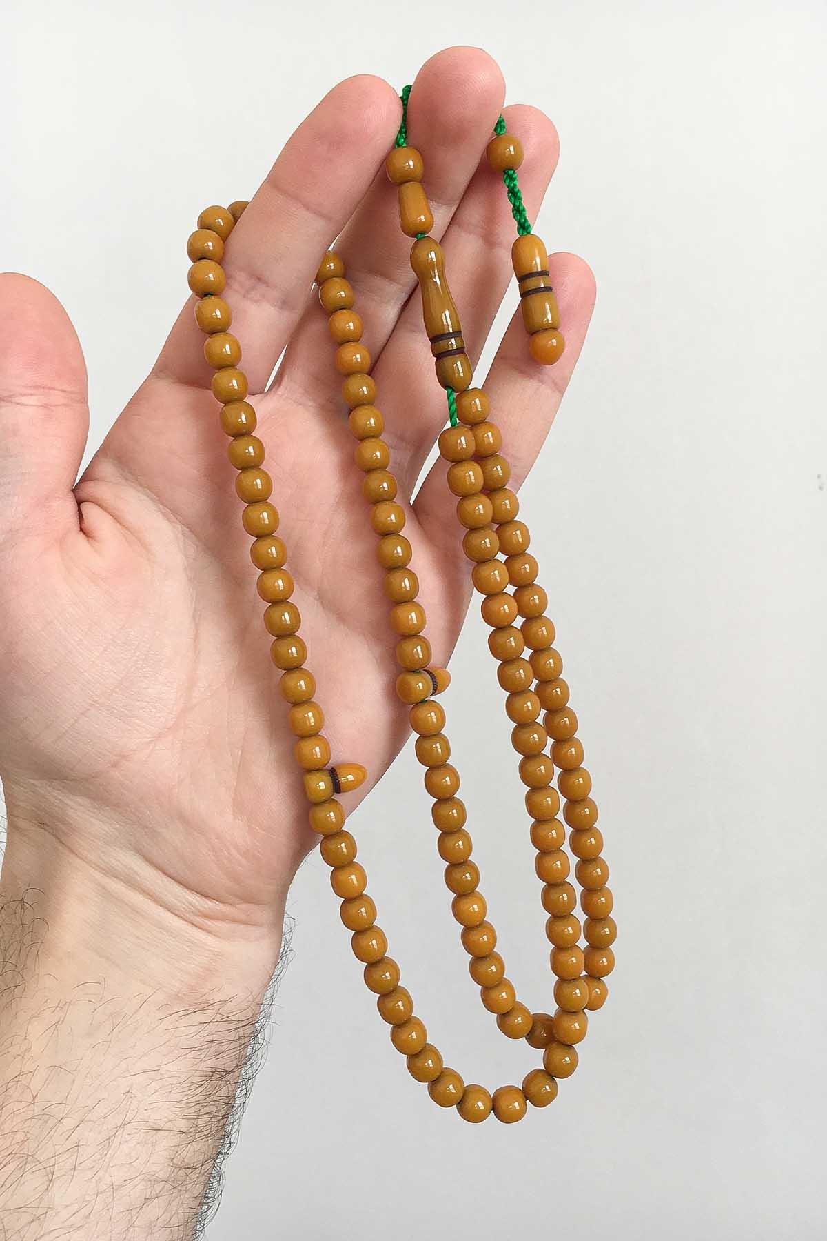 Koyu Sarı 99'Luk Sıkma Kehribar Tesbih