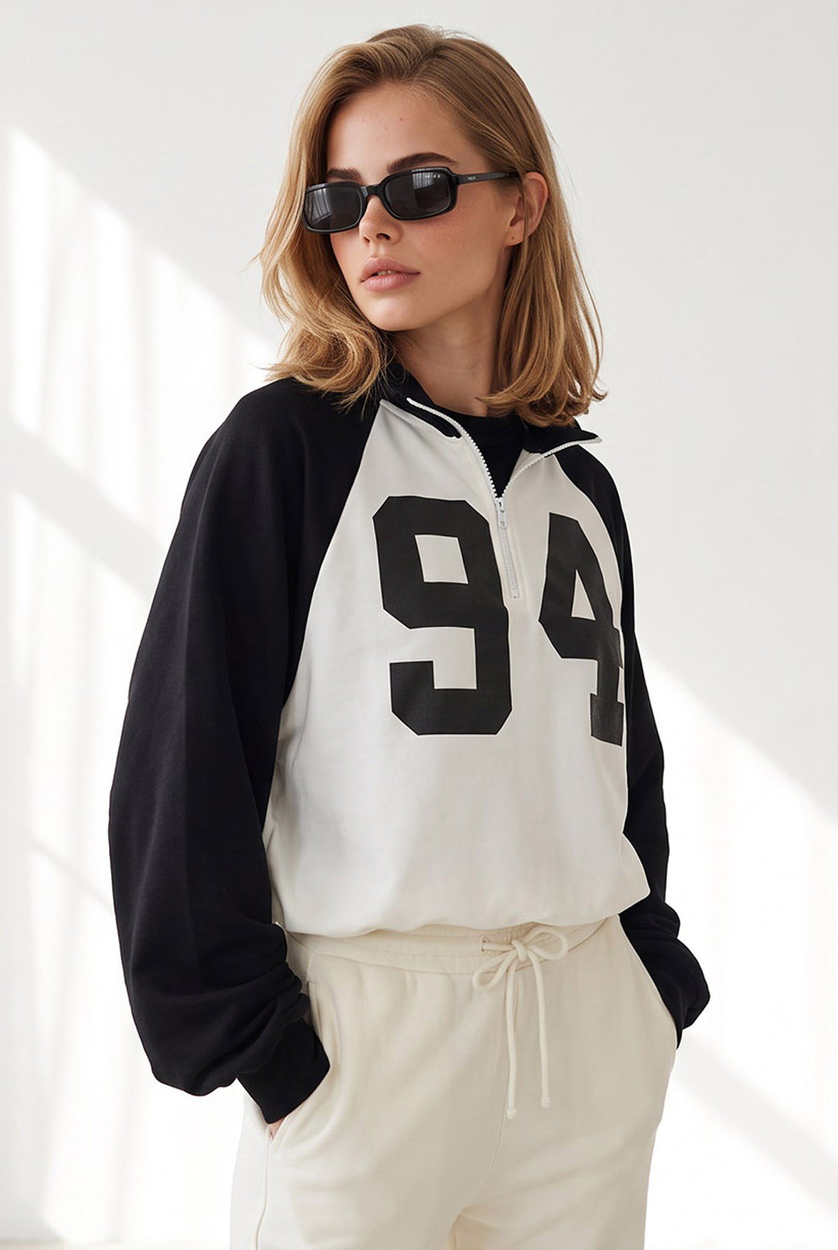Reglan Kol Yarım Fermuarlı Dökümlü Sweatshirt Siyah