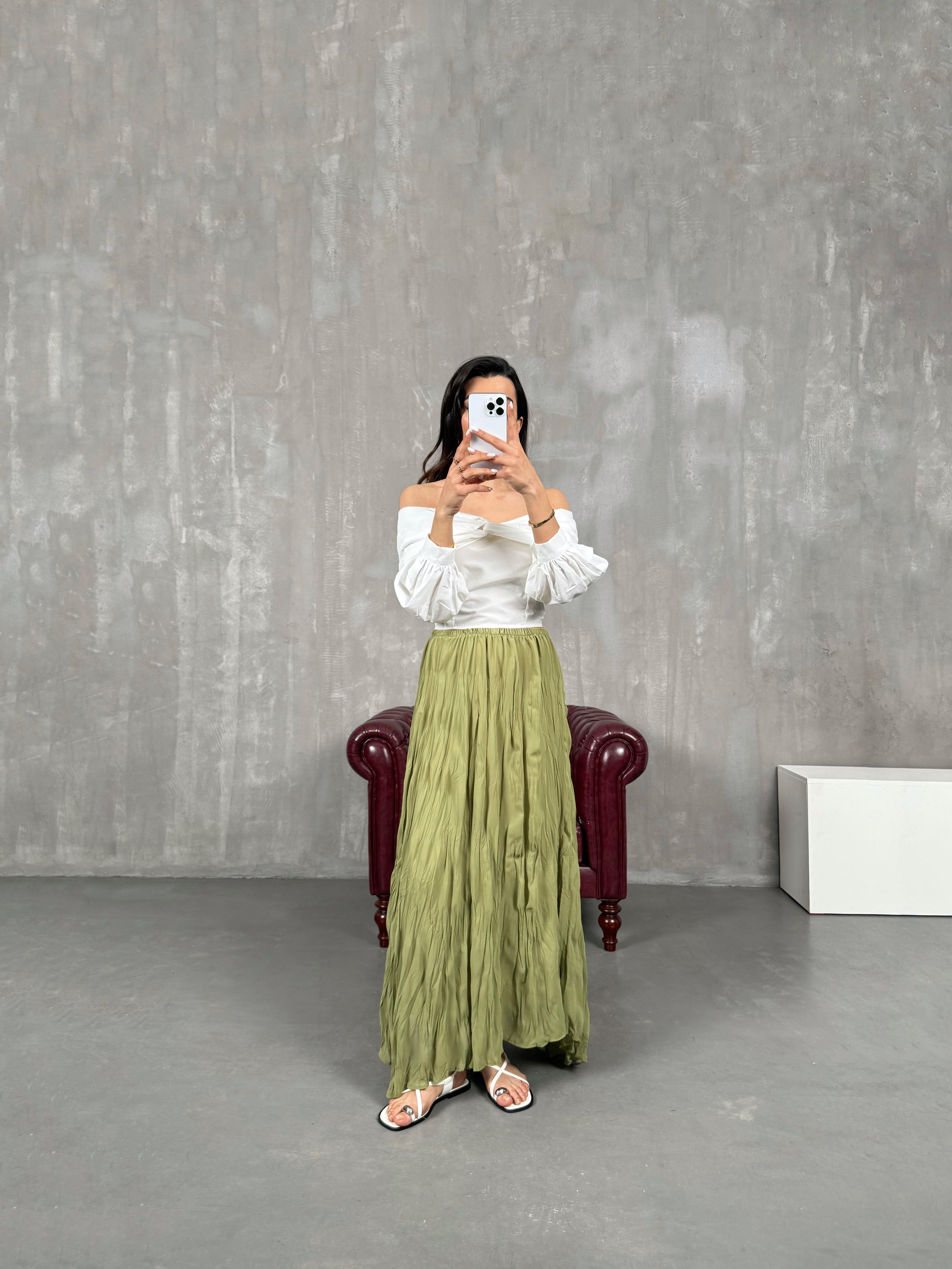 تنورة لون أخضر مبطنّة وبتفاصيل تول مجعّد Gaus00052