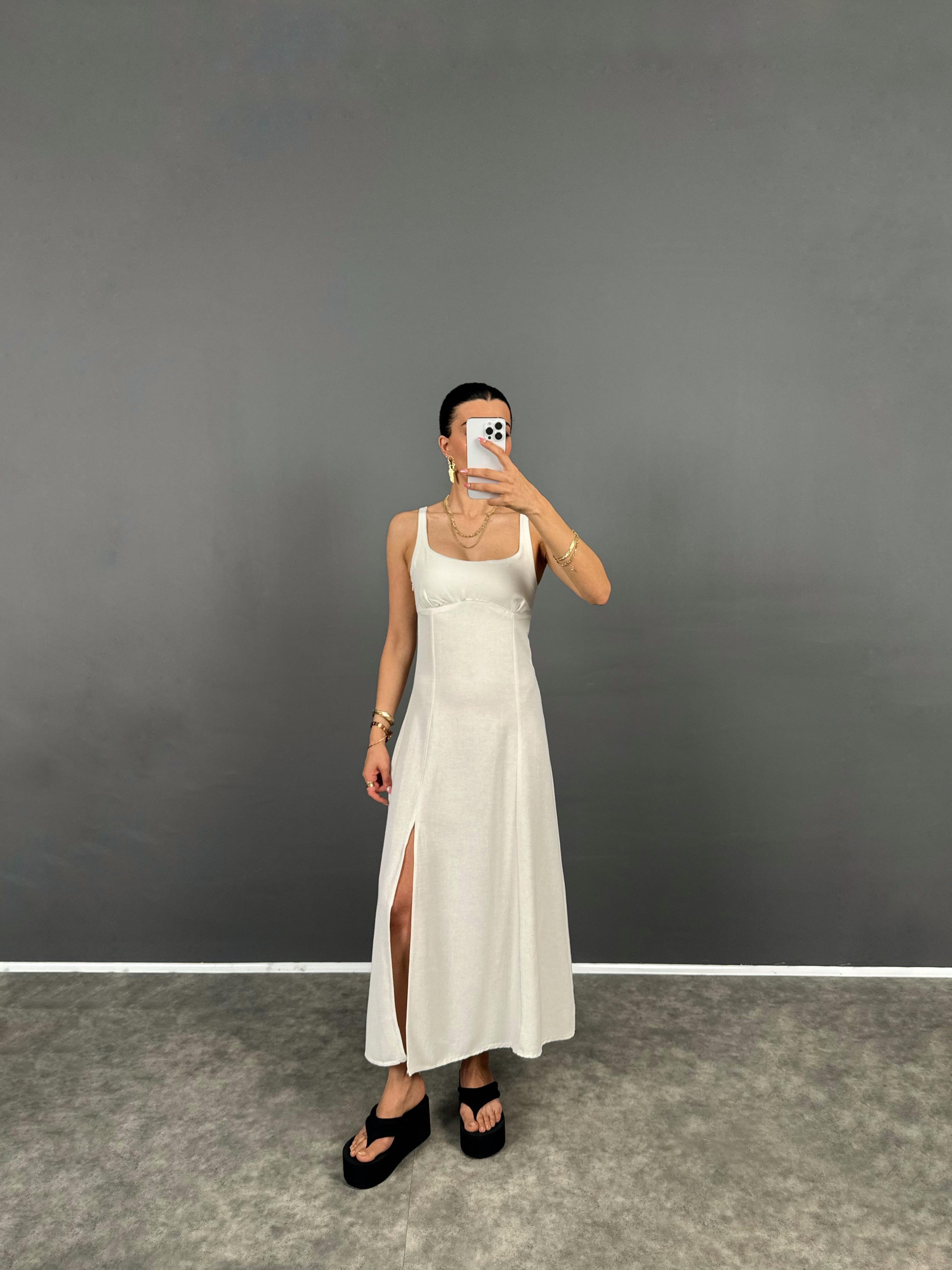  Uxor Taş Askılı Yırtmaçlı Uzun ZR Model Keten ElbiseGausELBİSEGU008663
