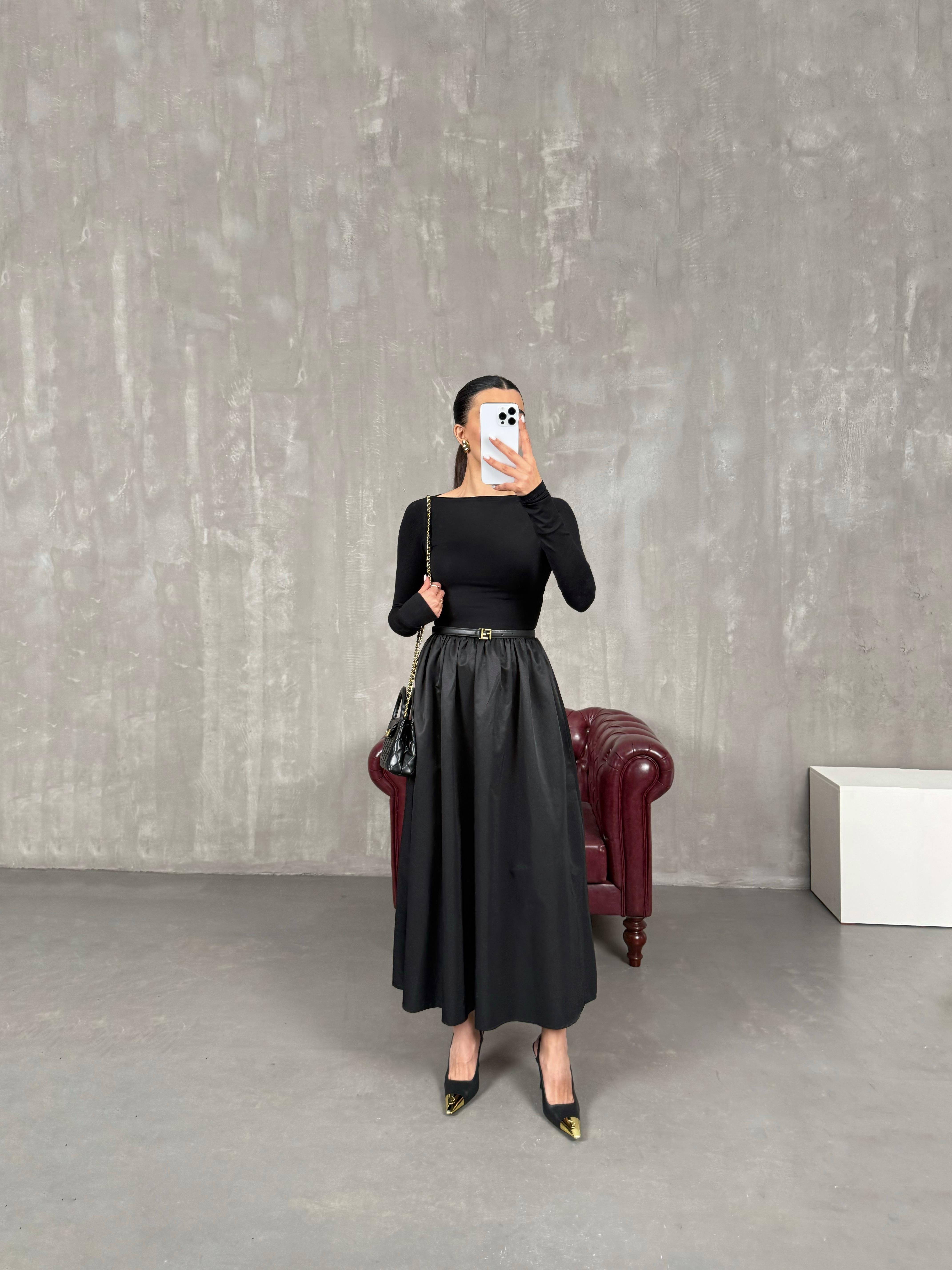 نوكس فستان بينتيريست أسود بأكمام طويلة