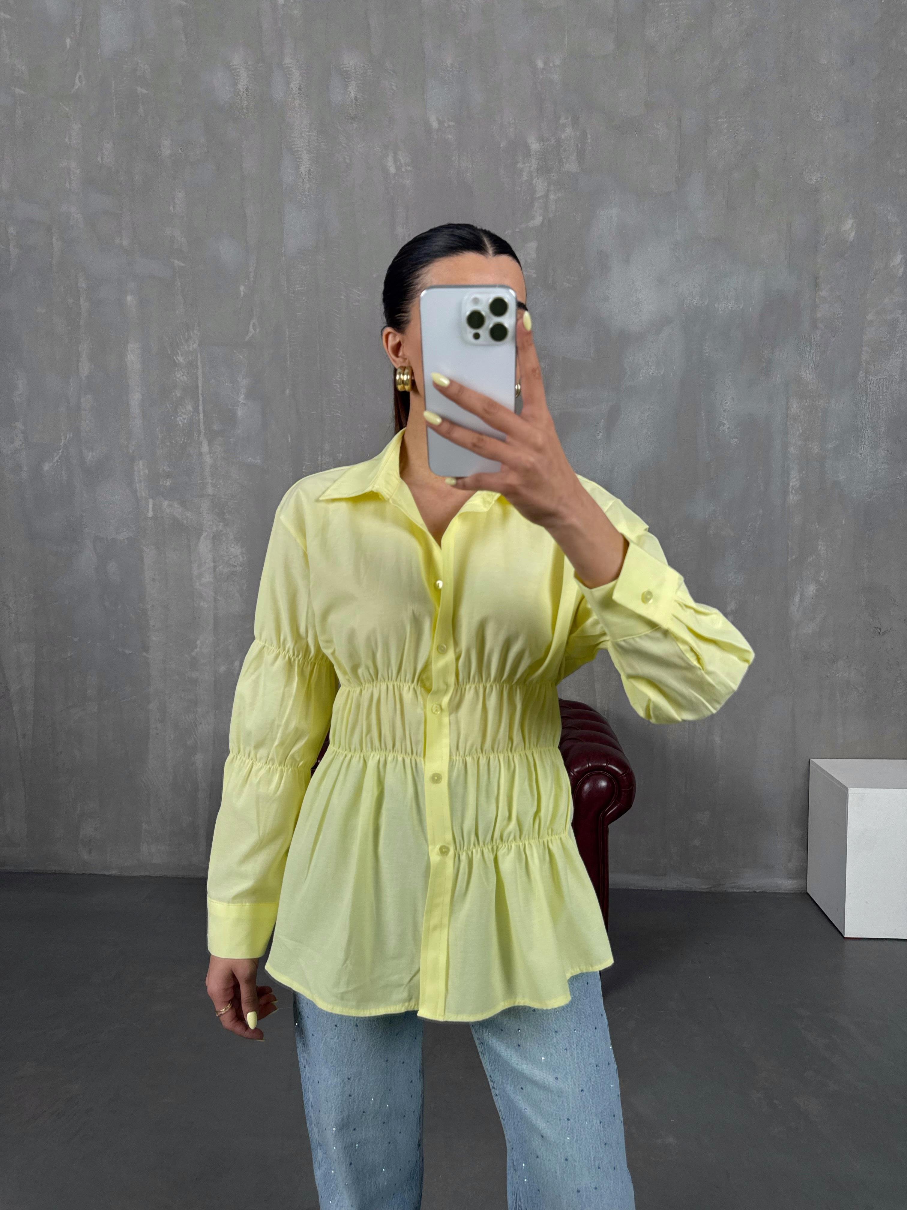 قميص أصفر بخصر مطاطي ومزين بالمطاط Gaus00087