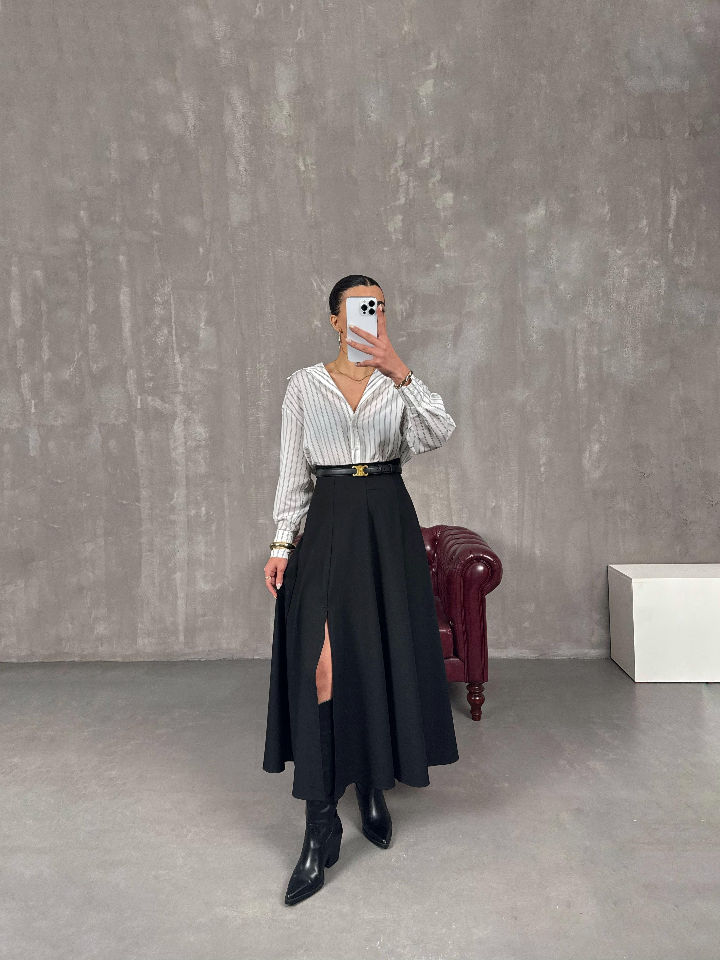 مافي تنورة سوداء بشق مع جيب