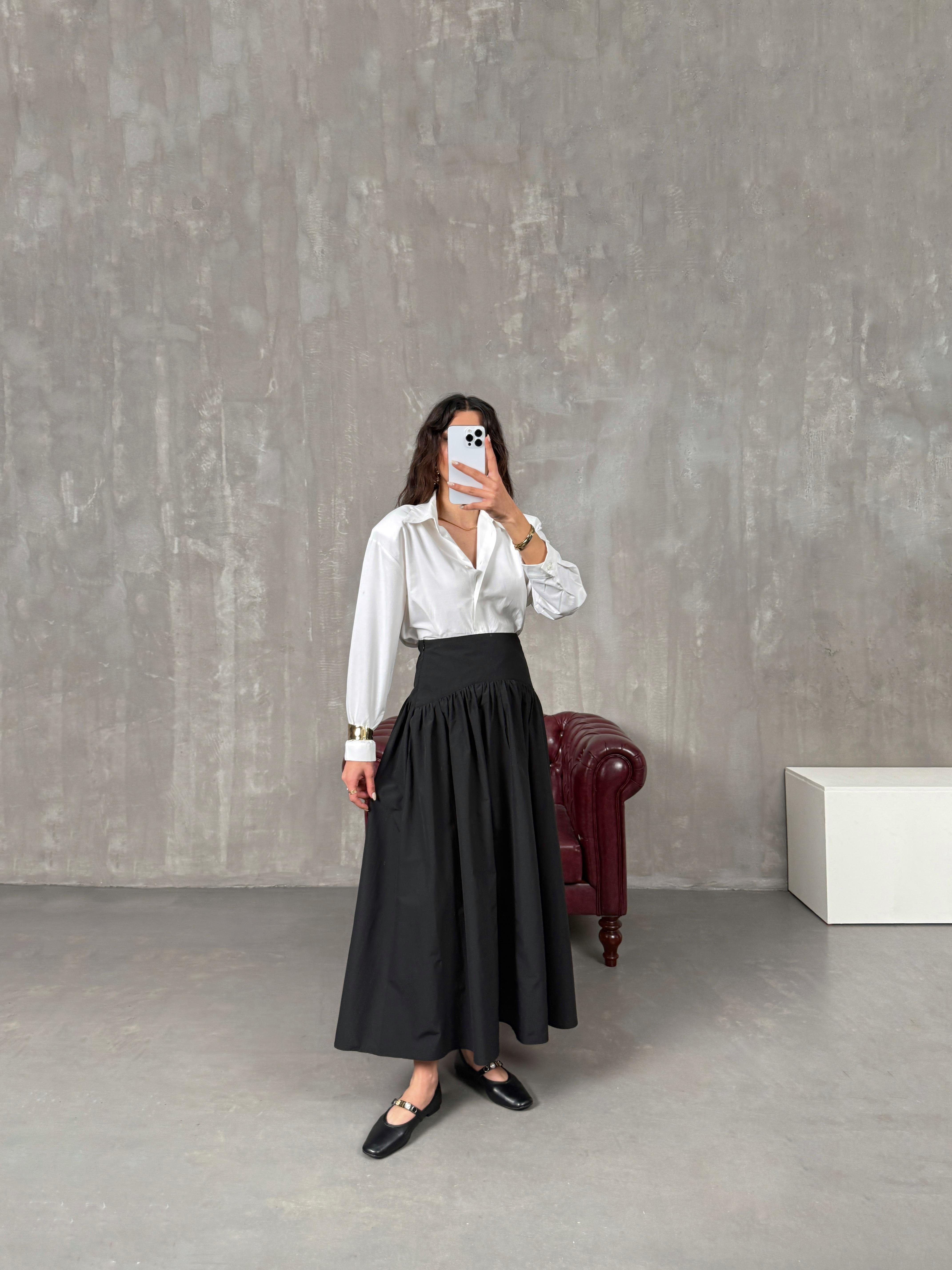 فاسكو تنورة لون أسود قماش بوبلين بتفاصيل خصر مُعادل لماسّي