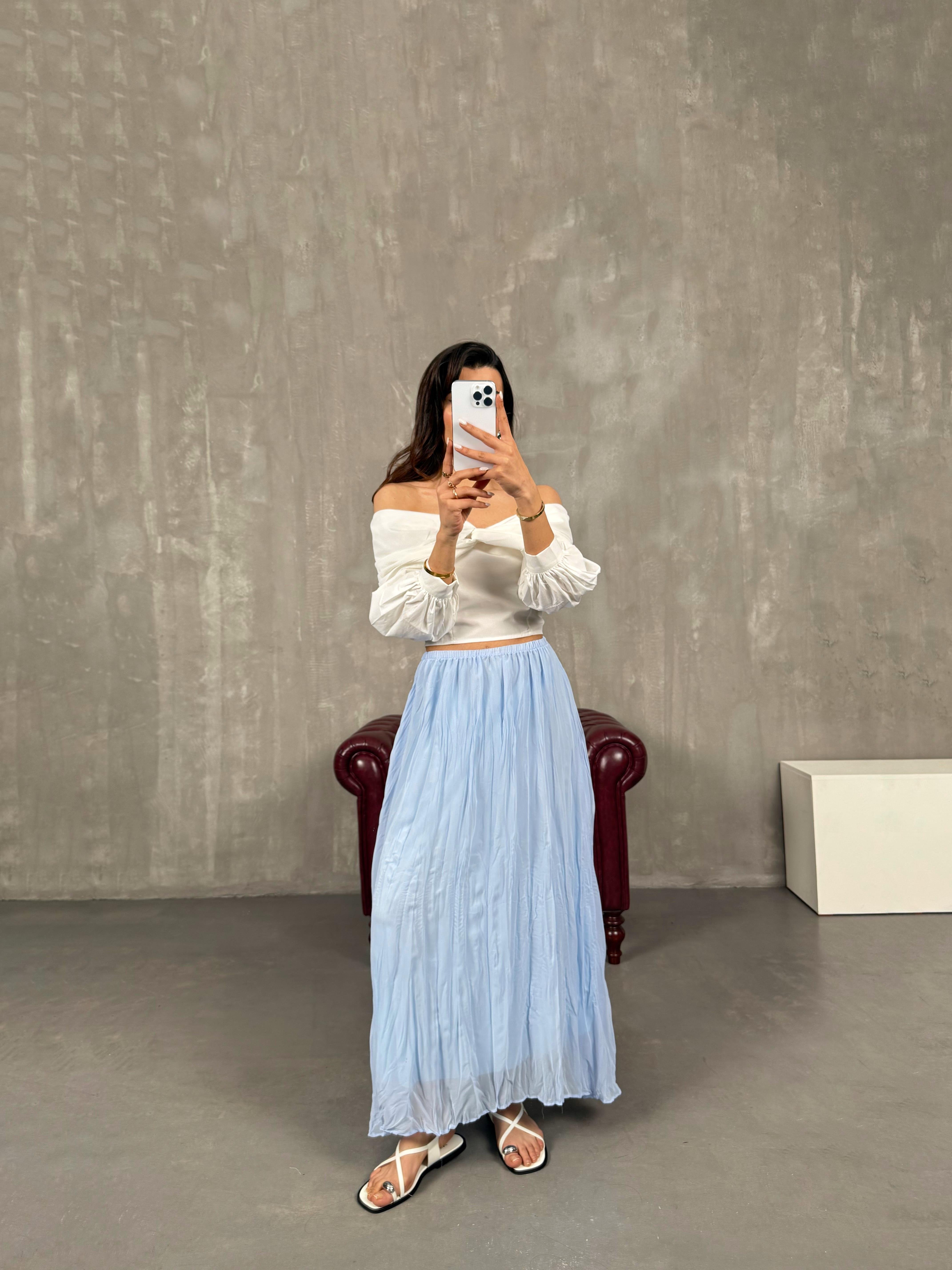 تنورة لون أزرق مبطنّة وبتفاصيل تول مجعّد Gaus00052